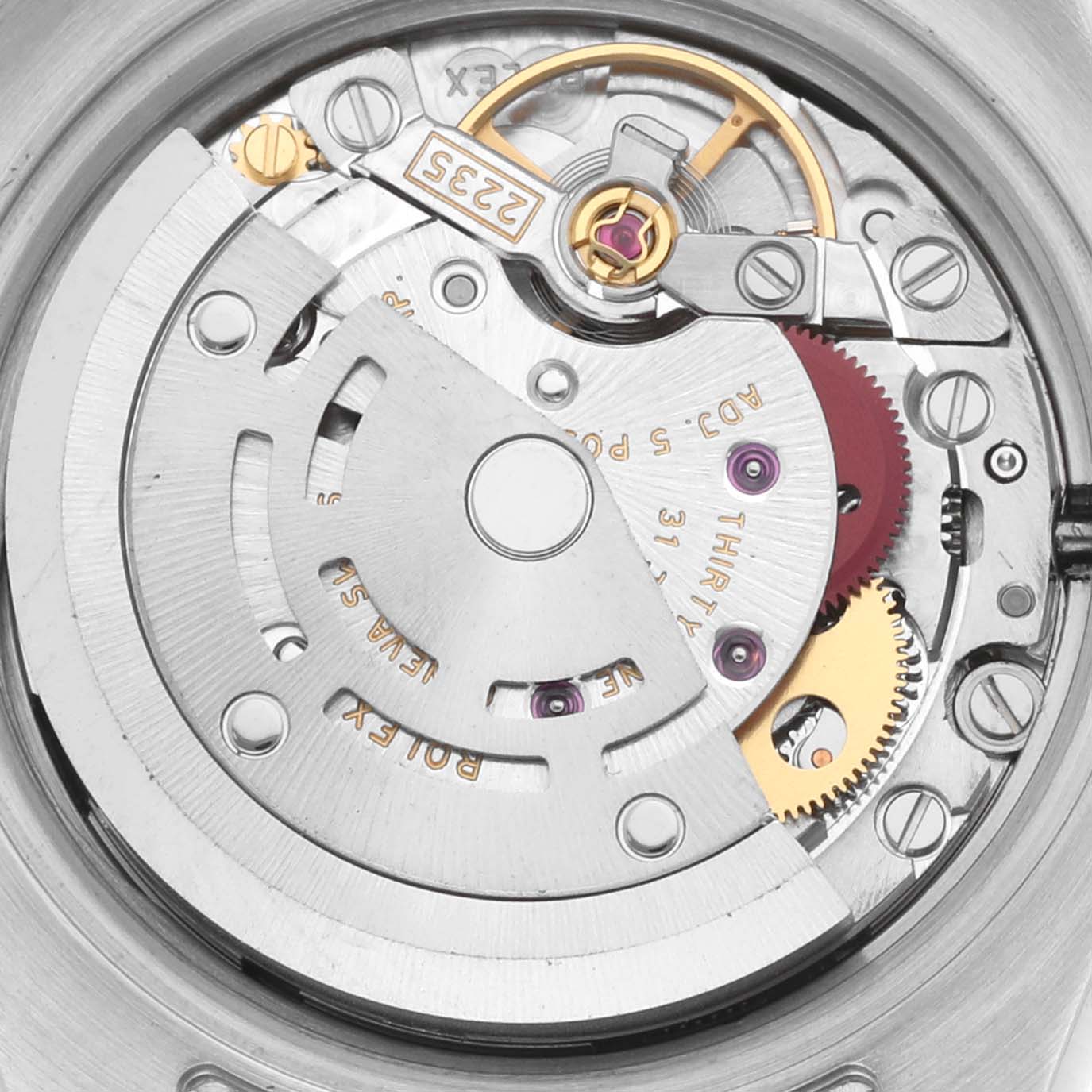 The image shows an internal view of the Rolex Datejust 179171 Women's Steel and Gold (two tone) Black Dial 179171 Women's Steel and Gold (two tone) Black Dial movement, highlighting gears and the rotor.