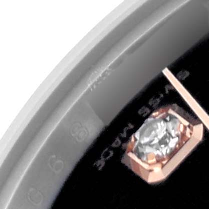 The image shows a close-up of the Rolex Datejust 179171 Women's Steel and Gold (two tone) Black Dial 179171 Women's Steel and Gold (two tone) Black Dial watch, focusing on the diamond hour marker and part of the dial edge.