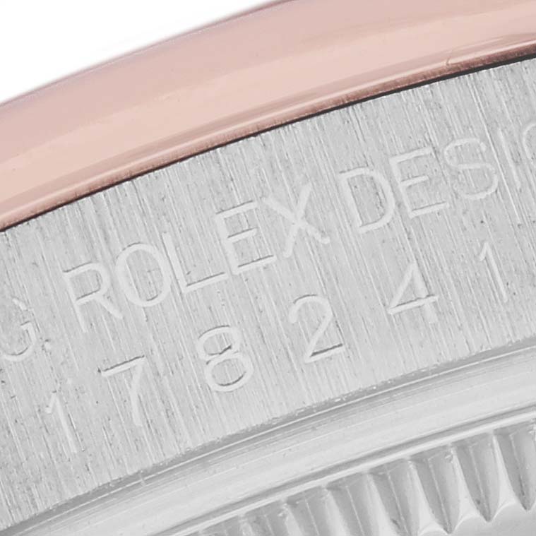 The image shows a close-up of the bezel and engraved details on a Rolex Datejust 178241 Women's Steel and Gold (two tone) Silver Dial 178241 Women's Steel and Gold (two tone) Silver Dial watch.