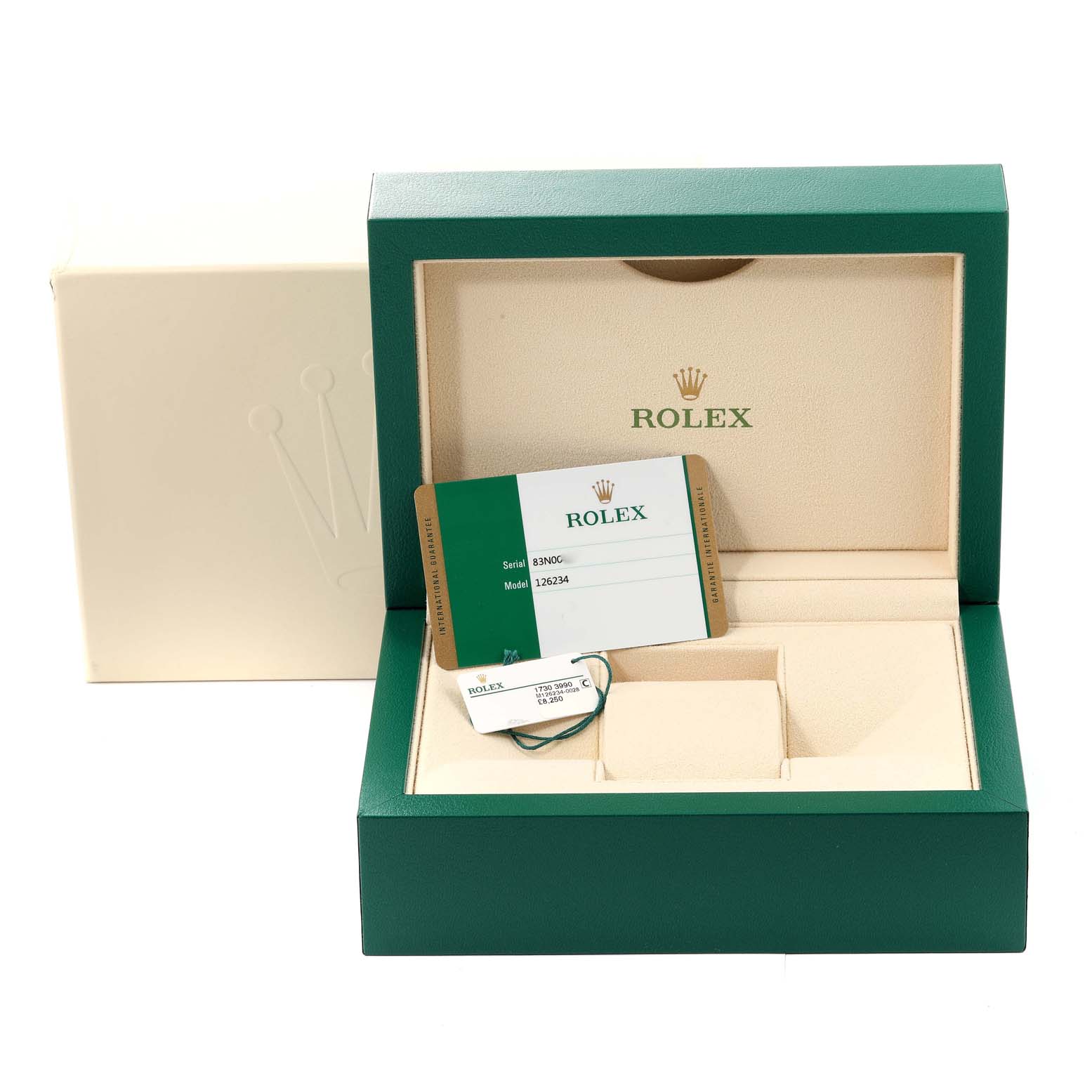The image shows the open box and accessories (card, tag) of a Rolex Datejust 126234 Men
s Stainless Steel Black Dial 126234 Men
s Stainless Steel Black Dial model from a front angle.