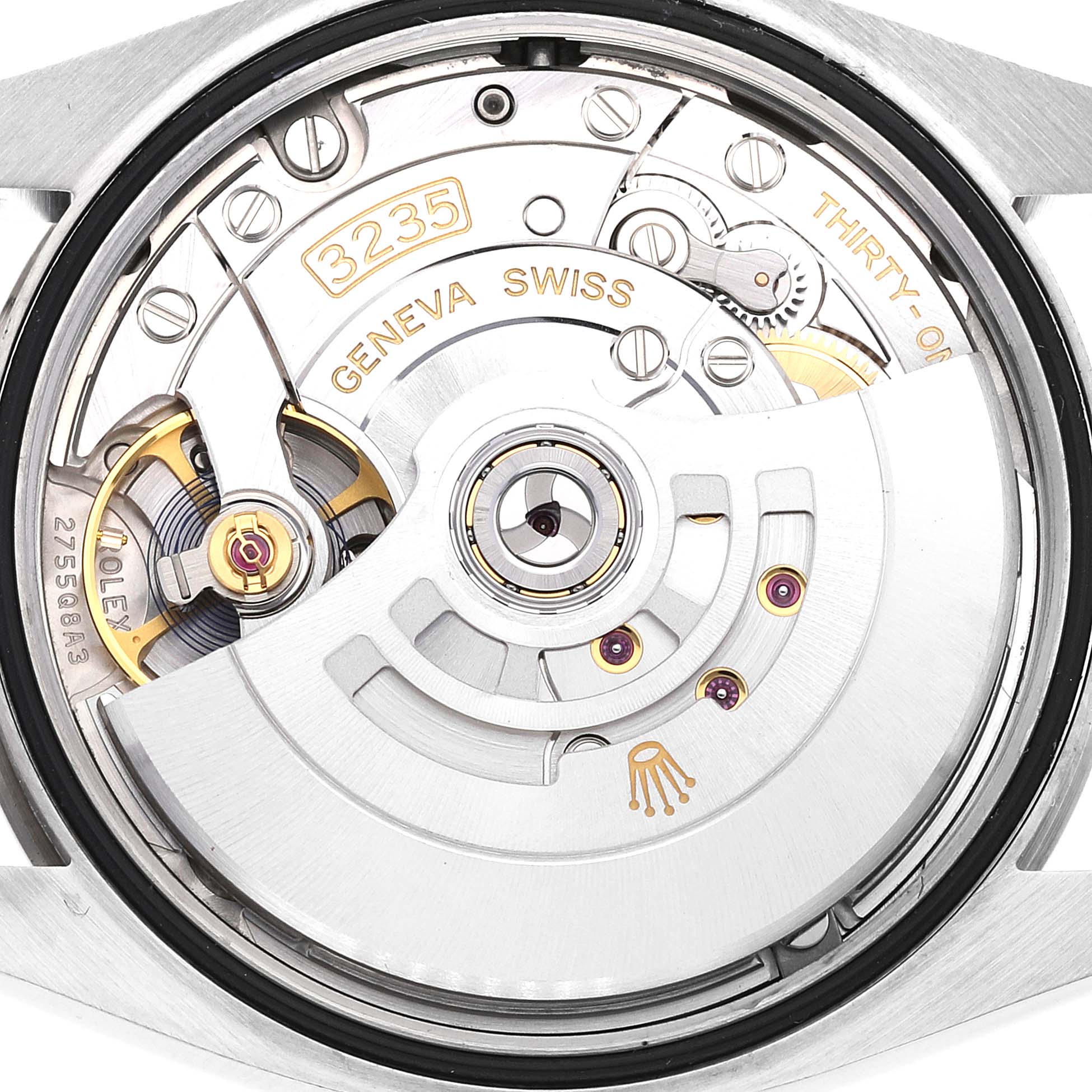 The image shows the inner mechanical movement of a Rolex Datejust 126234 Men
s Stainless Steel Black Dial 126234 Men
s Stainless Steel Black Dial watch, displaying parts like the rotor, gears, and inscriptions.