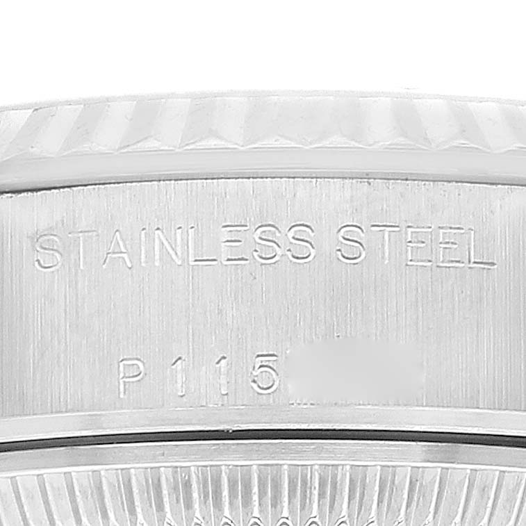 This image shows a close-up of the Rolex Datejust 79174 Women's Stainless Steel Silver Dial 79174 Women's Stainless Steel Silver Dial watch's side, highlighting its stainless steel case with engraving.