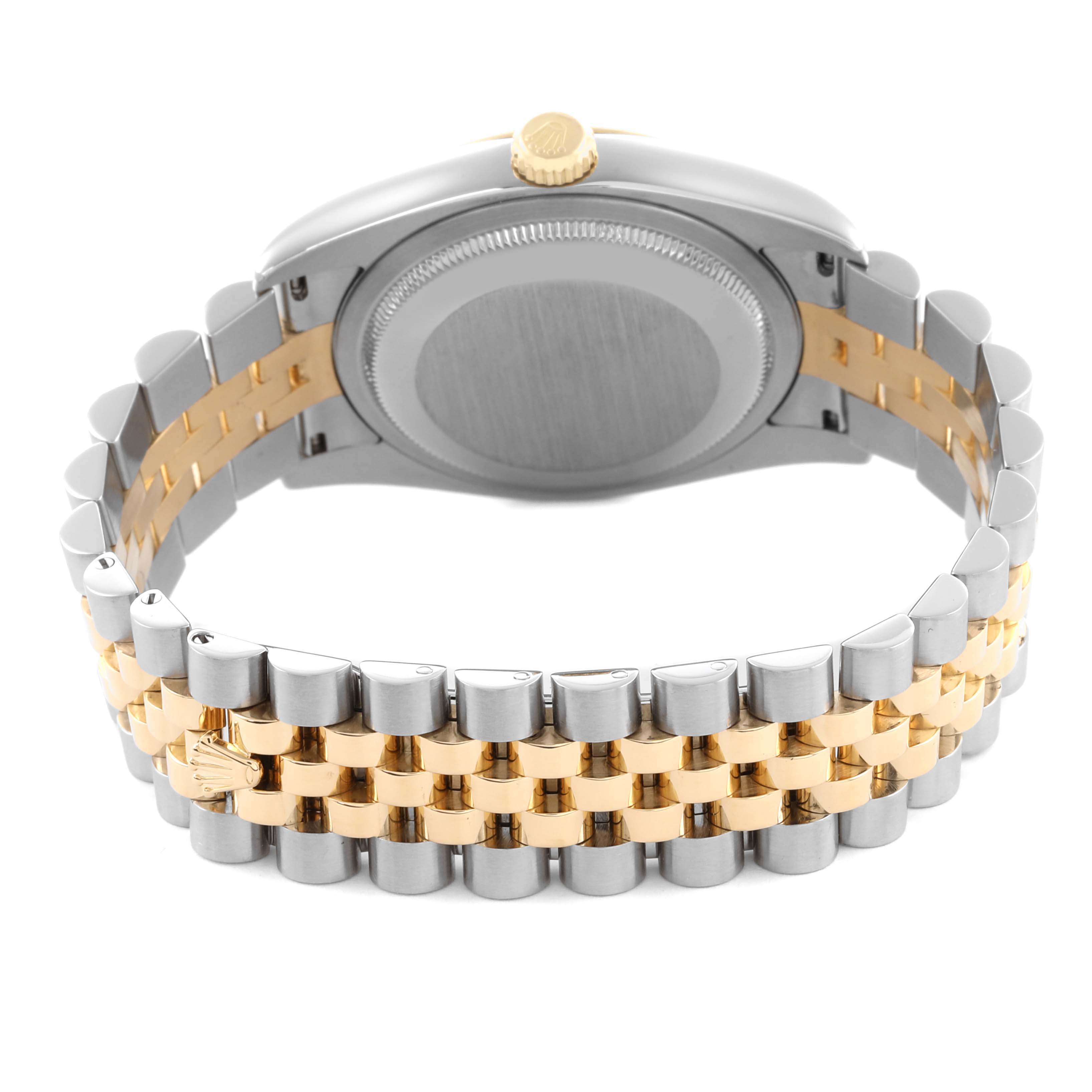 The image shows the back of a Rolex Datejust 116233 Men's Steel and Gold (two tone) Champagne Dial 116233 Men's Steel and Gold (two tone) Champagne Dial, highlighting its two-tone bracelet and case back.