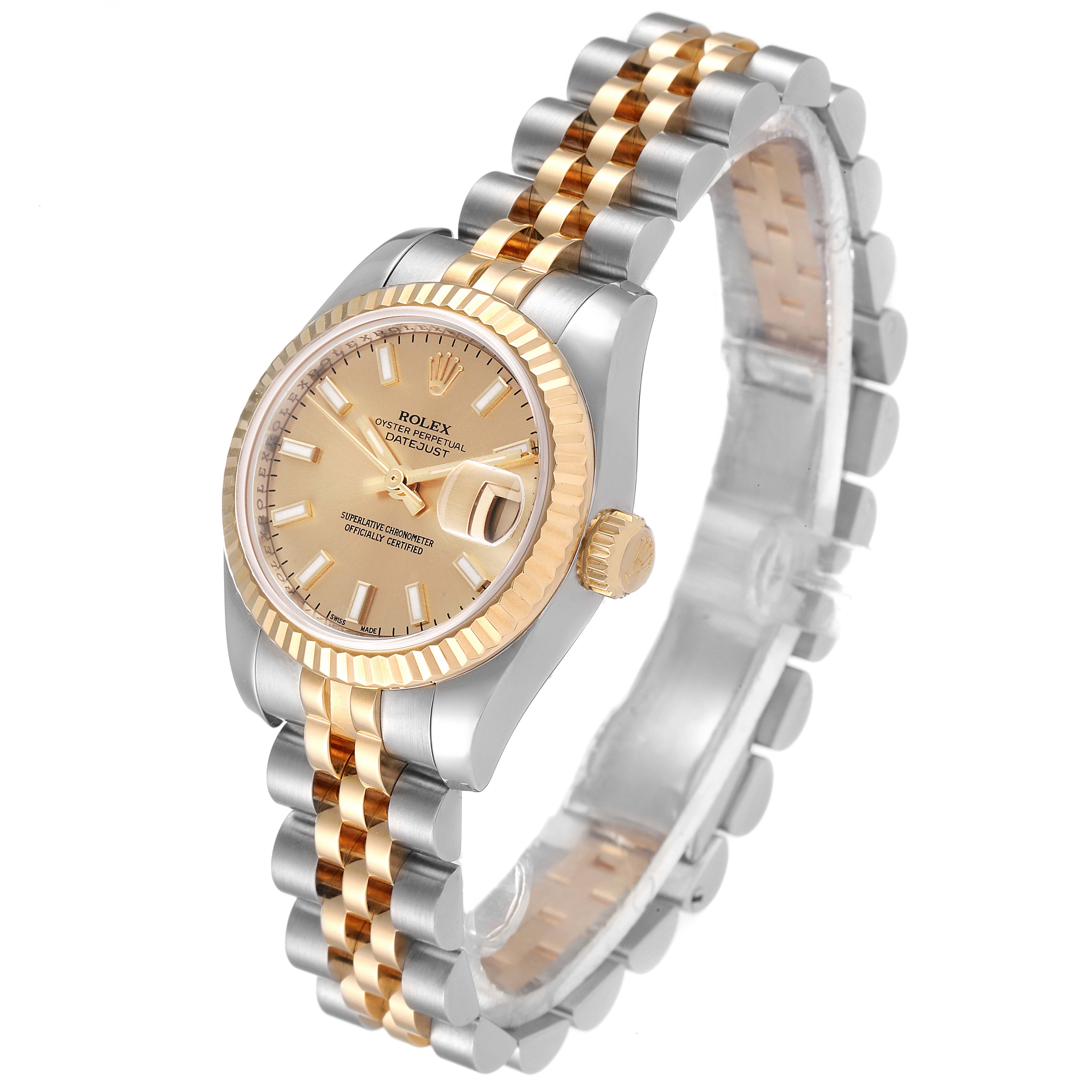 The image shows a Rolex Datejust 179173 Women's Steel and Gold (two tone) Champagne Dial 179173 Women's Steel and Gold (two tone) Champagne Dial watch at a three-quarter angle, displaying the face, bezel, crown, and bracelet.