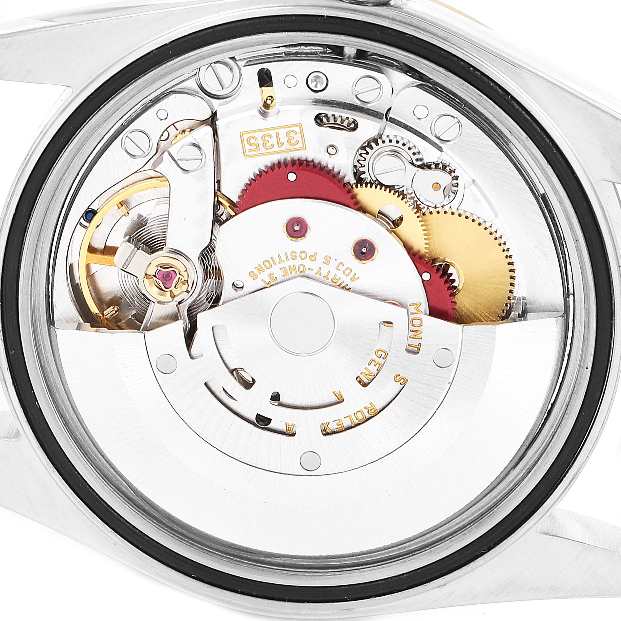 This is the back view of a Rolex Datejust 16233 Men's Steel and Gold (two tone) Champagne Dial 16233 Men's Steel and Gold (two tone) Champagne Dial showing its intricate movement and mechanics.