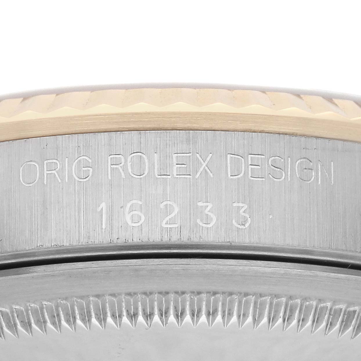The image shows the side view of the Rolex Datejust 16233 Men's Steel and Gold (two tone) Champagne Dial 16233 Men's Steel and Gold (two tone) Champagne Dial watch case, highlighting the engraving "ORIG ROLEX DESIGN" and model number.