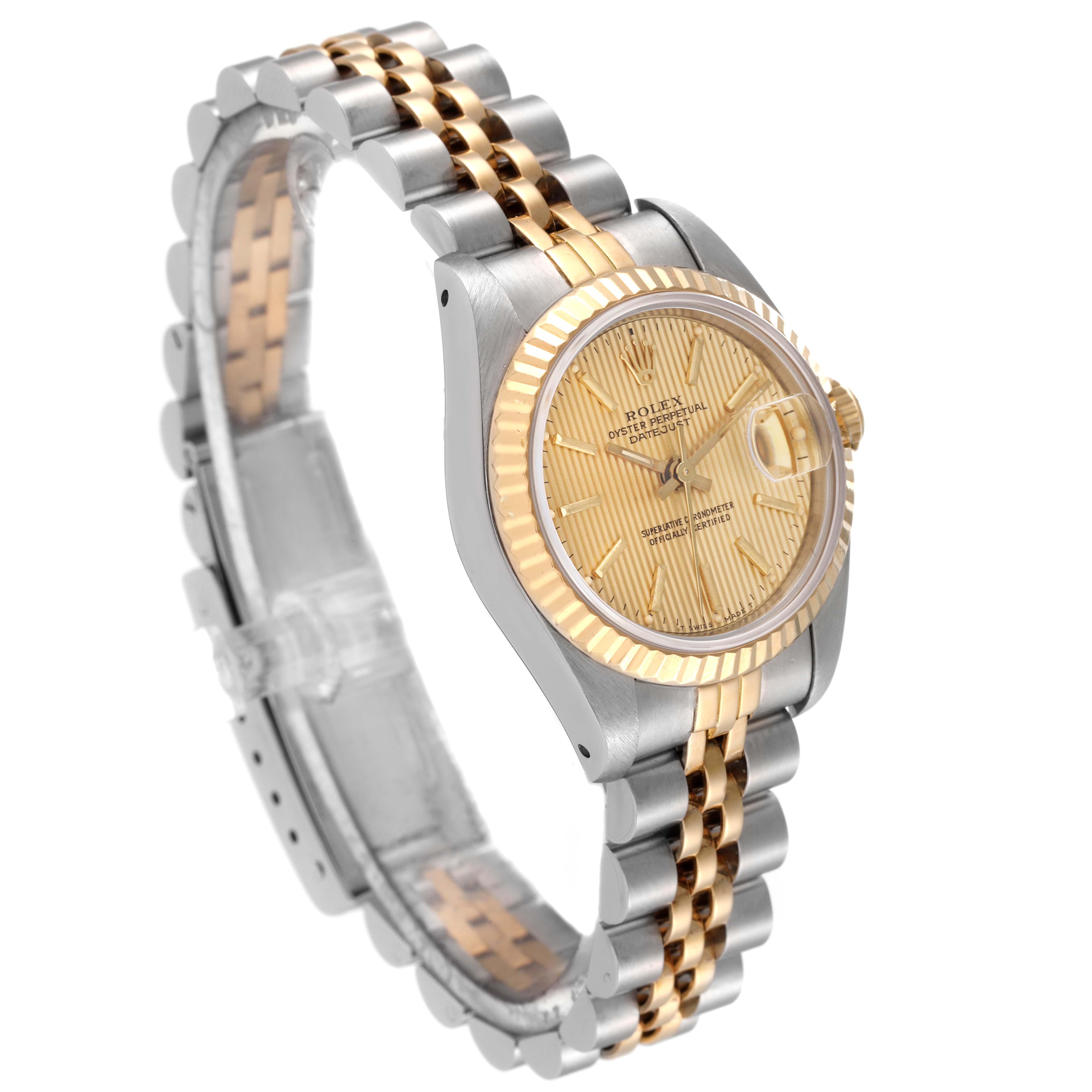 The Rolex Datejust 69173 Women's Steel and Gold (two tone) Champagne Dial 69173 Women's Steel and Gold (two tone) Champagne Dial watch is shown at a three-quarter angle, highlighting the face, fluted bezel, and two-tone jubilee bracelet.