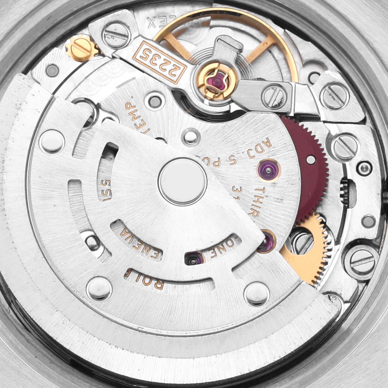 The image shows the internal mechanism of a Rolex Datejust 179173 Women's Steel and Gold (two tone) White Dial 179173 Women's Steel and Gold (two tone) White Dial, focusing on the rotor and movement components.