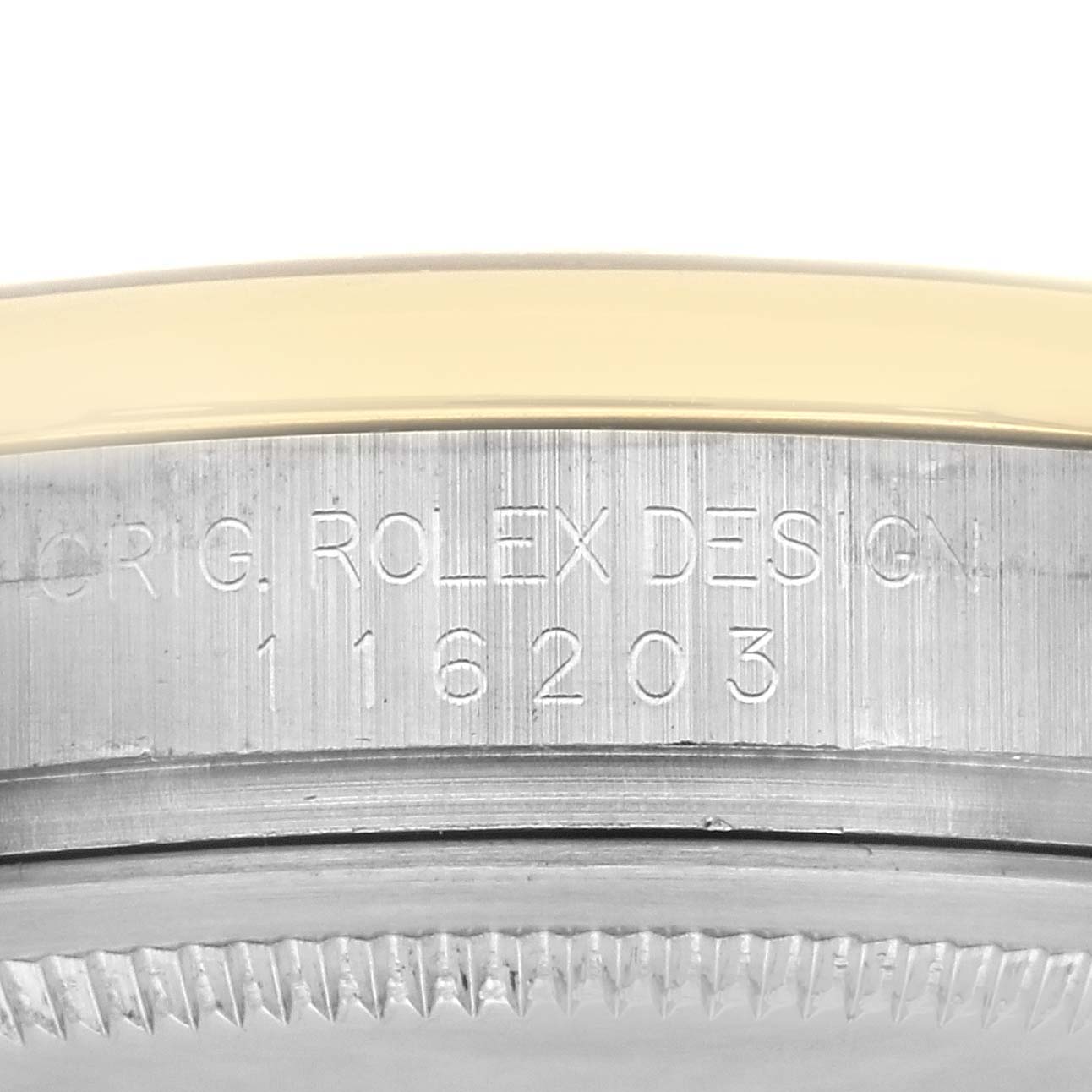 The image shows the side view of a Rolex Datejust 116203 Men's Steel and Gold (two tone) Black Dial 116203 Men's Steel and Gold (two tone) Black Dial, focusing on the engraved case design and model number.