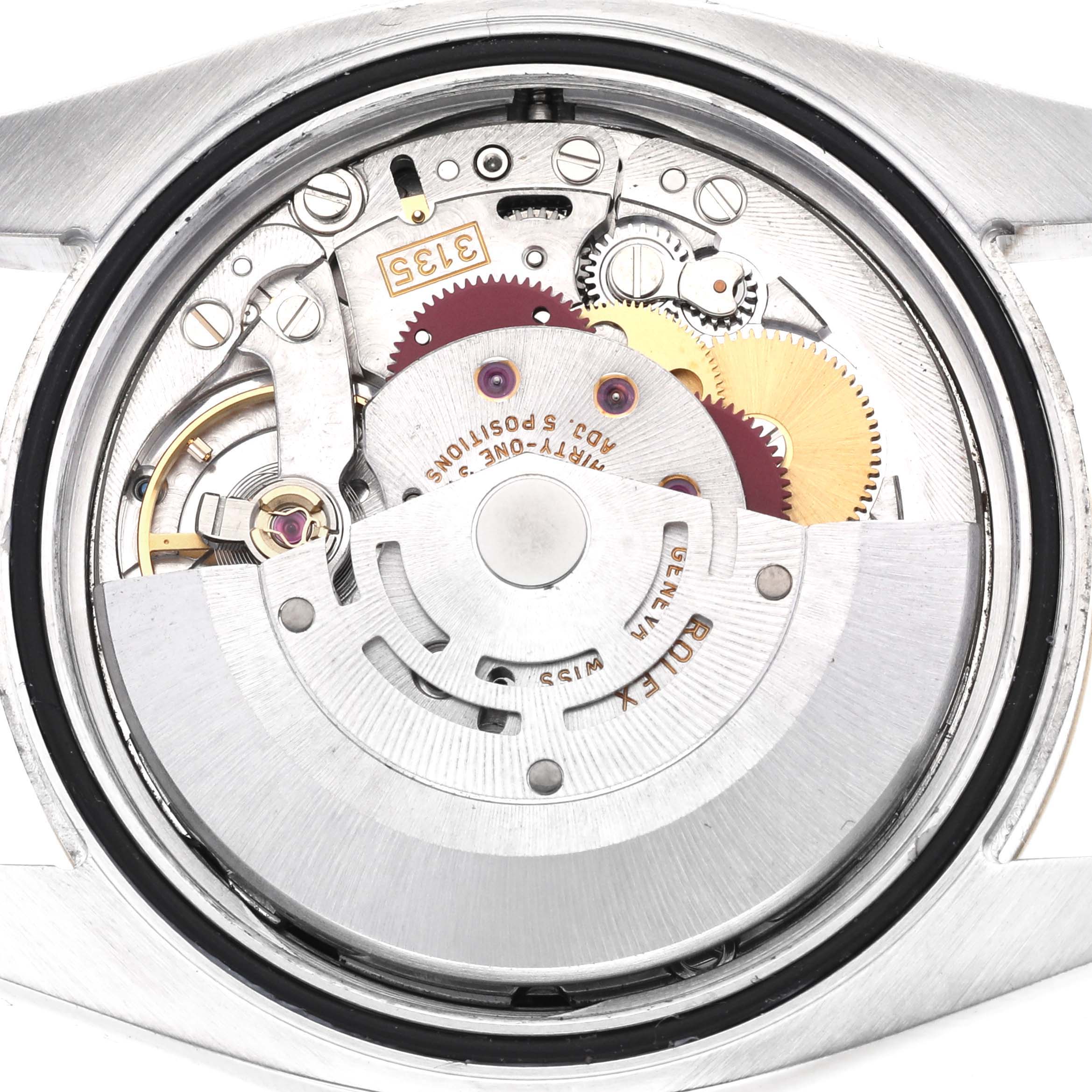 The image shows the internal mechanism of a Rolex Datejust 116203 Men's Steel and Gold (two tone) Black Dial 116203 Men's Steel and Gold (two tone) Black Dial watch from a back angle.