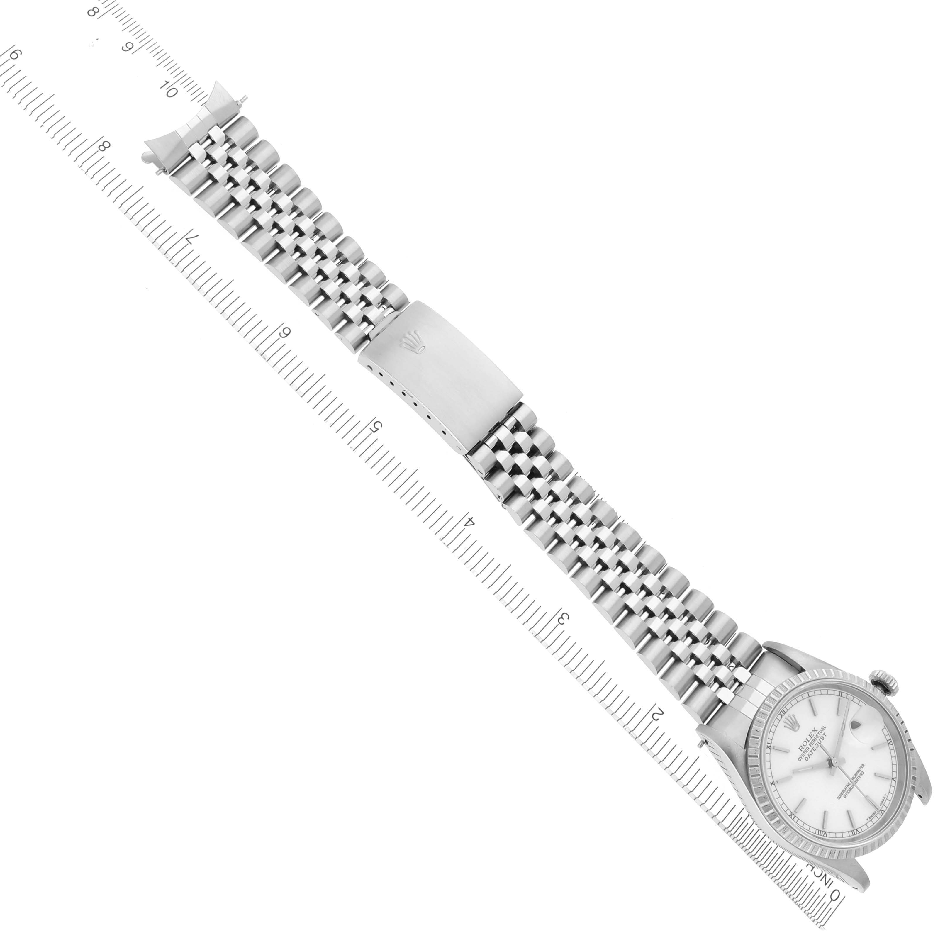 The Rolex Datejust 16220 Men
s Stainless Steel White Dial 16220 Men
s Stainless Steel White Dial watch is shown from an overhead angle, highlighting the dial, bracelet, and clasp.