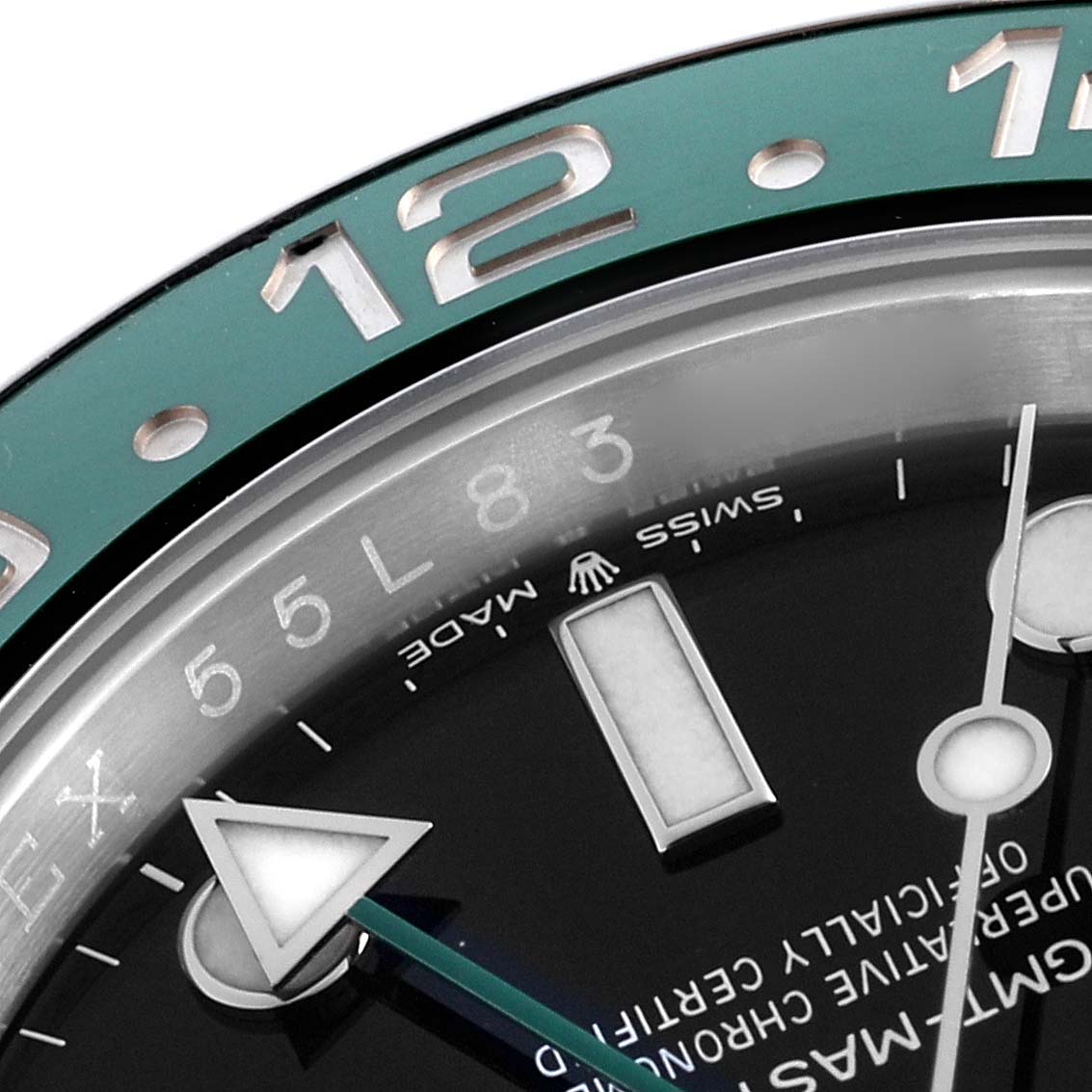 The image shows a close-up of the Rolex GMT-Master 126720 Men's Stainless Steel Black Dial 126720 Men's Stainless Steel Black Dial's watch face, highlighting the bezel, dial, and hour markers.