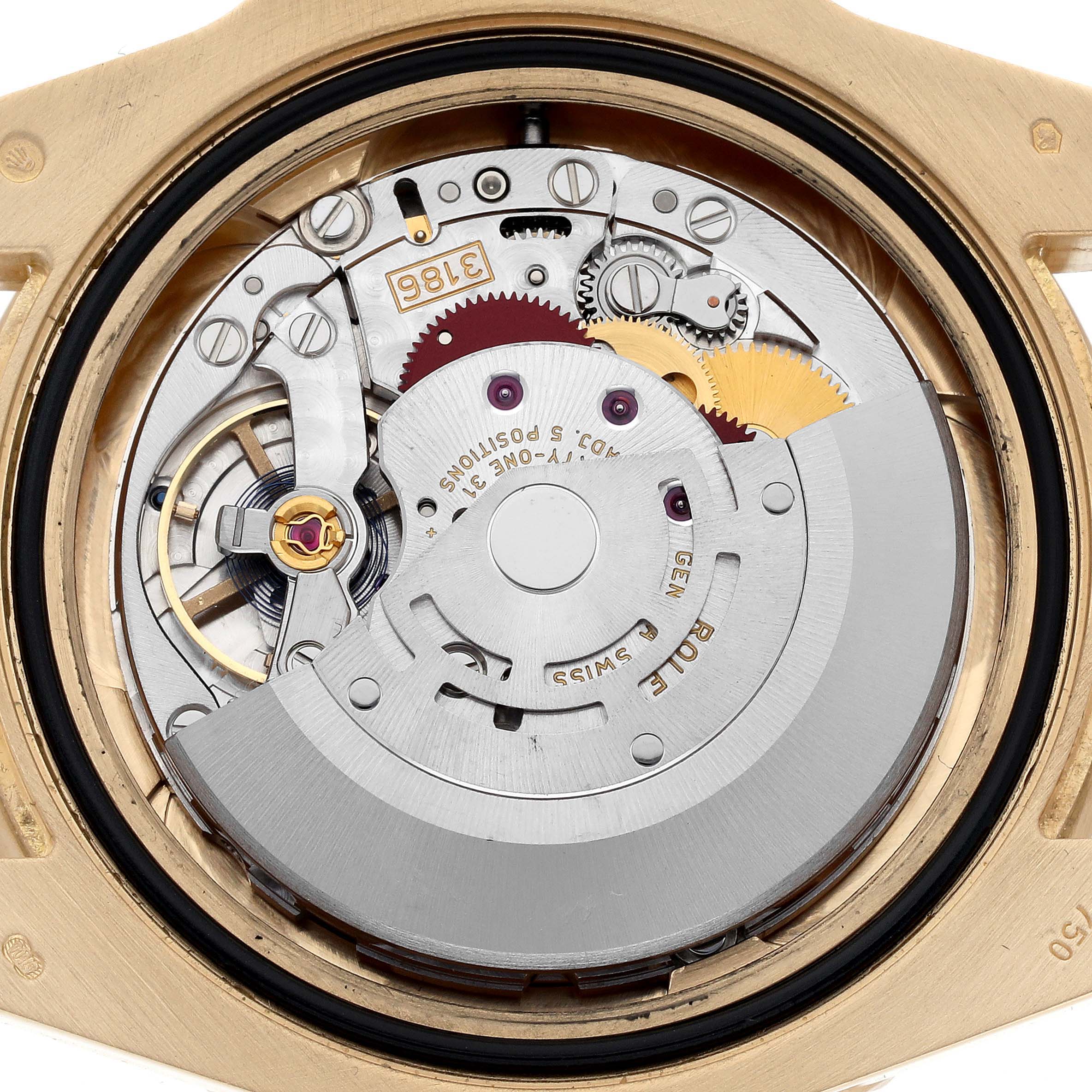 The image shows the movement of a Rolex GMT-Master 116718 Men's Yellow Gold Green Dial 116718 Men's Yellow Gold Green Dial watch viewed from the back, revealing its intricate inner components.