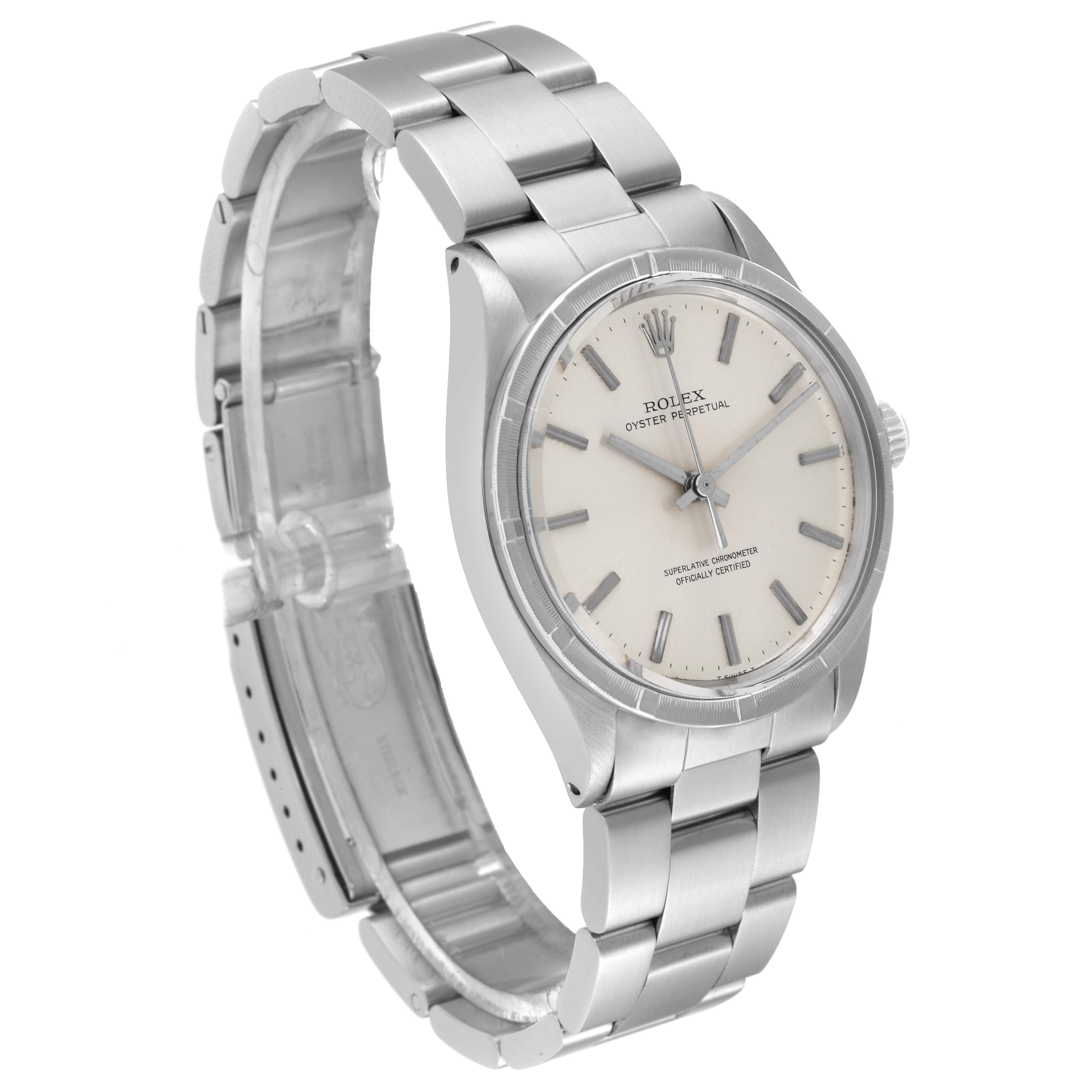 This image shows a Rolex Vintage Collection 1007 Men's Stainless Steel Silver Dial 1007 Men's Stainless Steel Silver Dial model watch at an angled side view, displaying the dial, bezel, crown, and stainless steel bracelet.