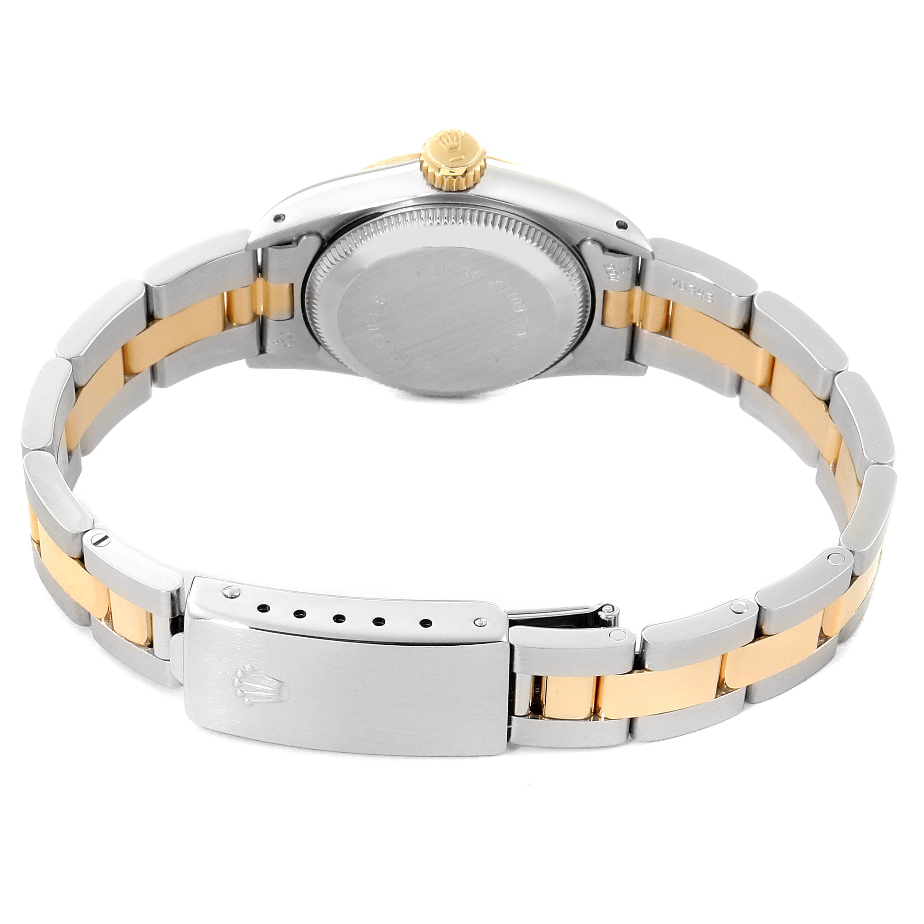 The image shows the back view of a Rolex Oyster Perpetual 67193 Women
s Steel and Gold (two tone) Champagne Dial 67193 Women
s Steel and Gold (two tone) Champagne Dial watch, highlighting the bracelet and clasp.
