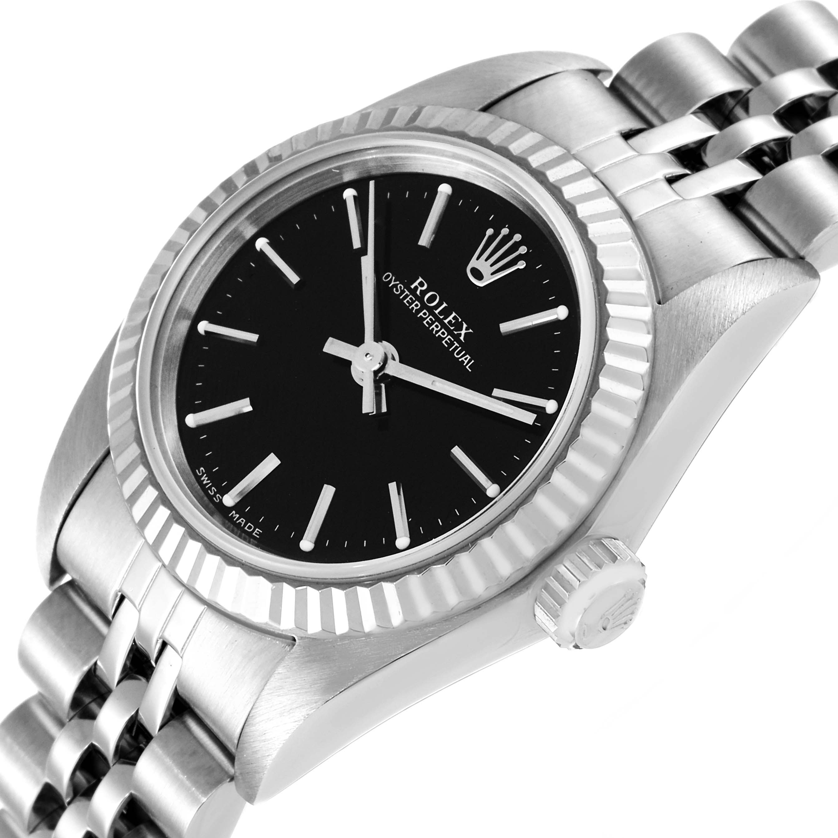 The image shows a close-up angle of a Rolex Oyster Perpetual 76094 Women's Stainless Steel Black Dial 76094 Women's Stainless Steel Black Dial watch displaying the dial, bezel, crown, and part of the bracelet.