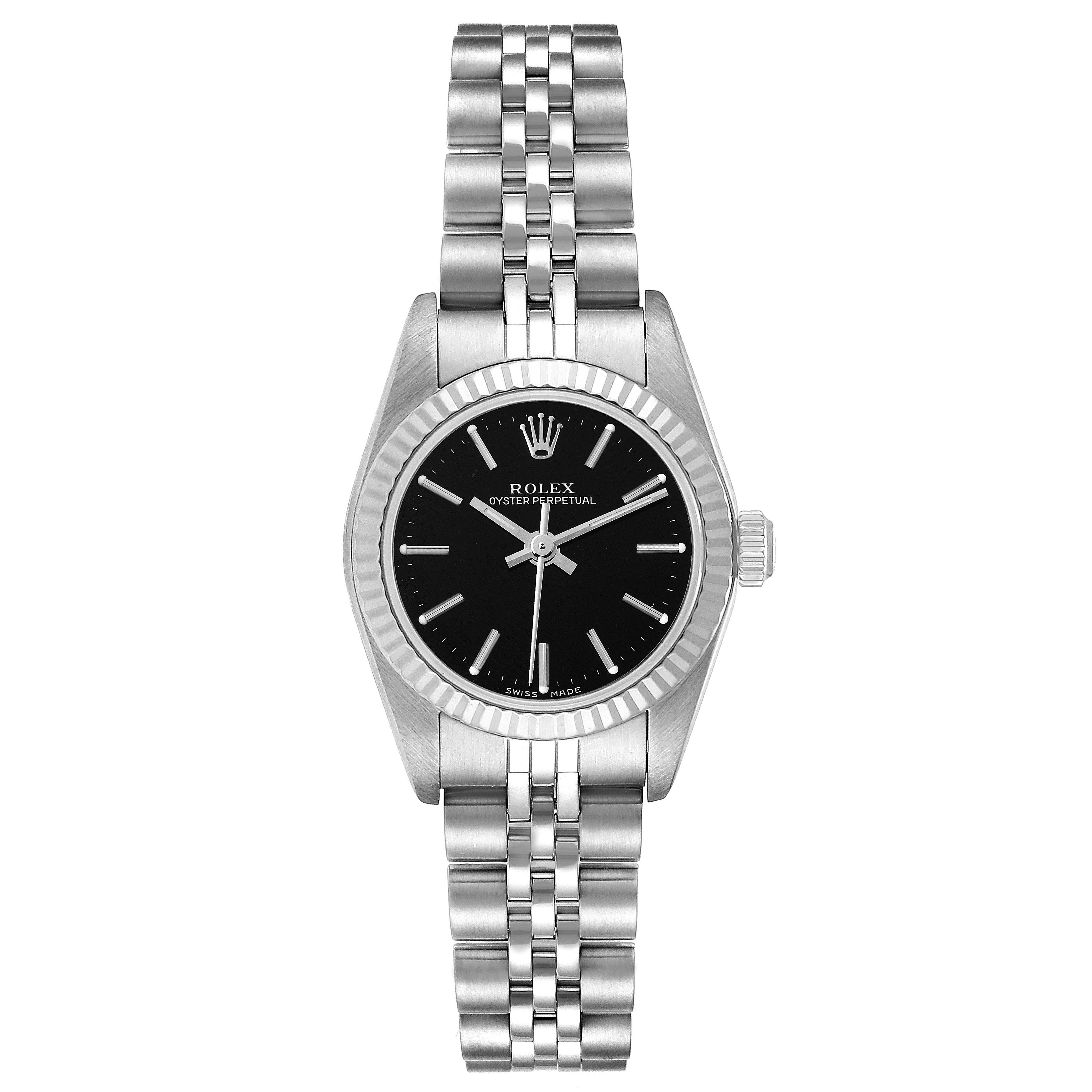 This image shows a Rolex Oyster Perpetual 76094 Women's Stainless Steel Black Dial 76094 Women's Stainless Steel Black Dial watch from a top-down angle, highlighting the bracelet, case, and dial.