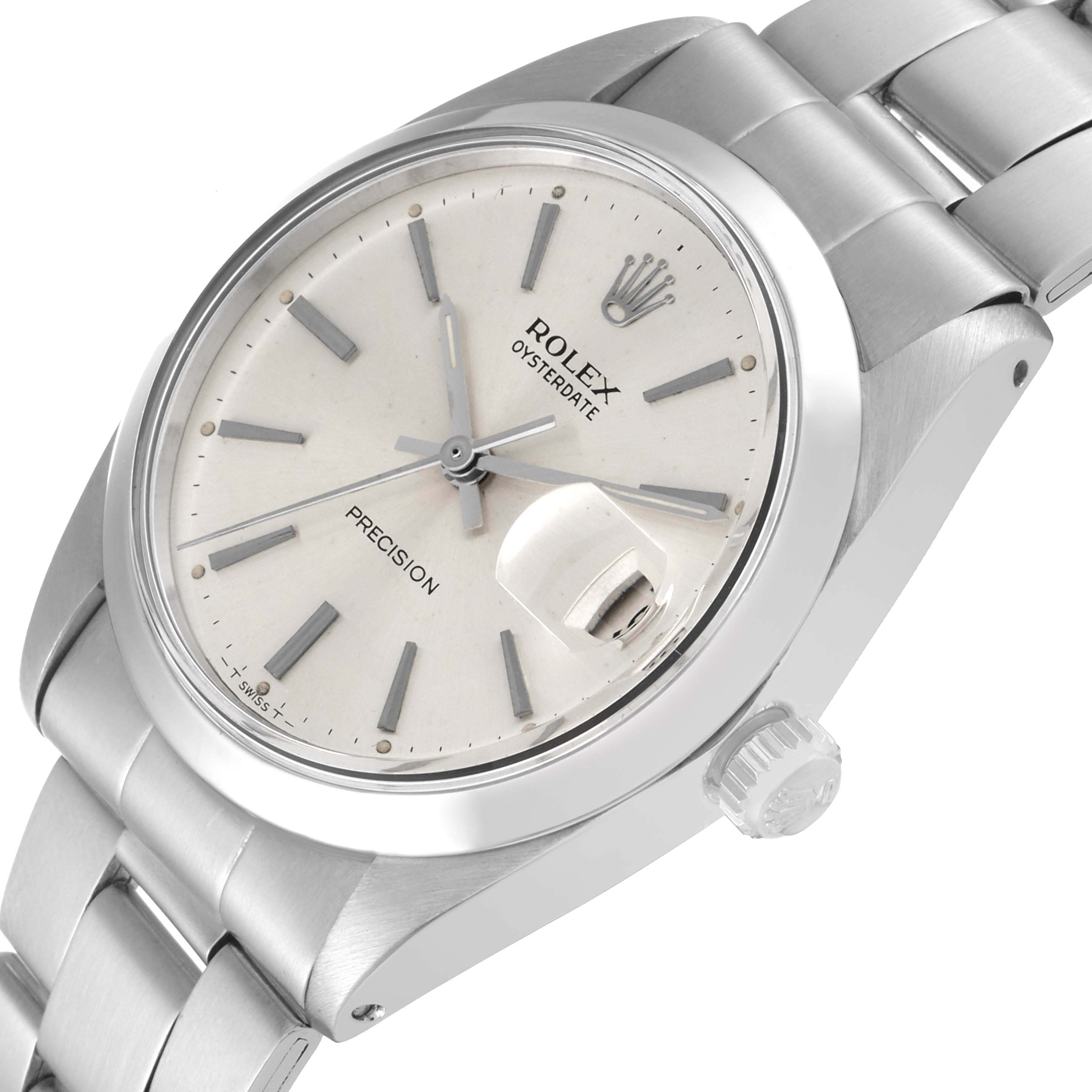 The image shows the dial, bezel, crown, and part of the bracelet of a Rolex Vintage Collection 6694 Men's Stainless Steel Silver Dial 6694 Men's Stainless Steel Silver Dial Oysterdate Precision watch at an angle.