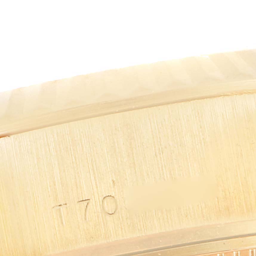 This image shows a close-up of the side and edge of the case of a Rolex President 69178 Women's Yellow Gold White Dial 69178 Women's Yellow Gold White Dial model watch, revealing part of its serial or model number.