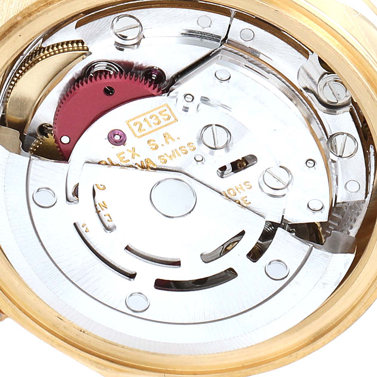 This image shows the internal movement mechanism of the Rolex President 69178 Women's Yellow Gold White Dial 69178 Women's Yellow Gold White Dial model watch, highlighting gears and components.