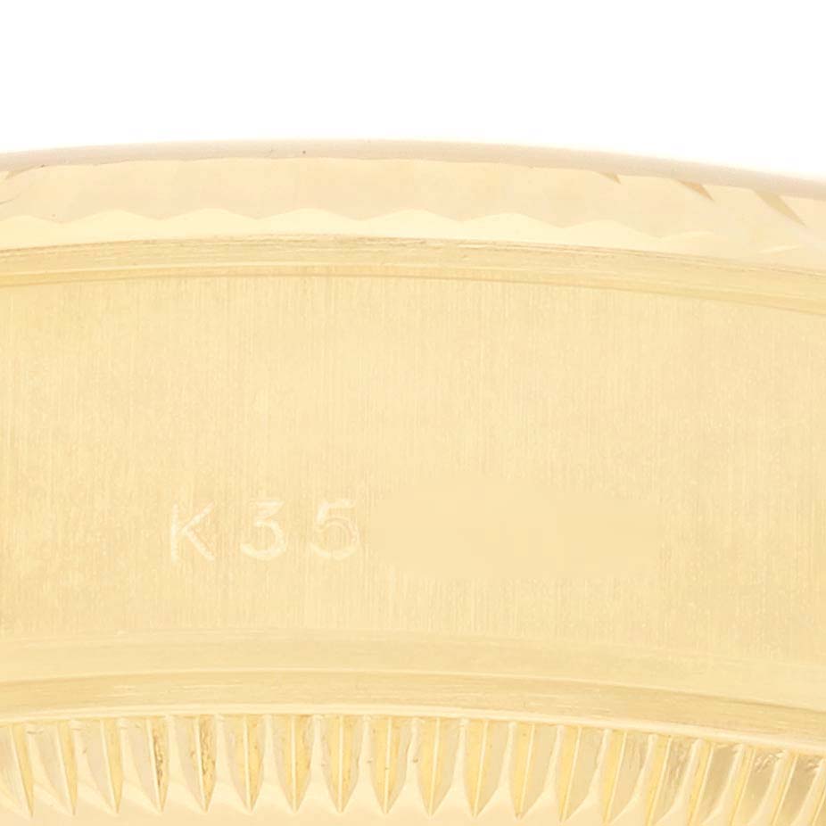 The image shows a close-up of the gold case edge and bezel of a Rolex President 79178 Women's Yellow Gold Champagne Dial 79178 Women's Yellow Gold Champagne Dial model watch.