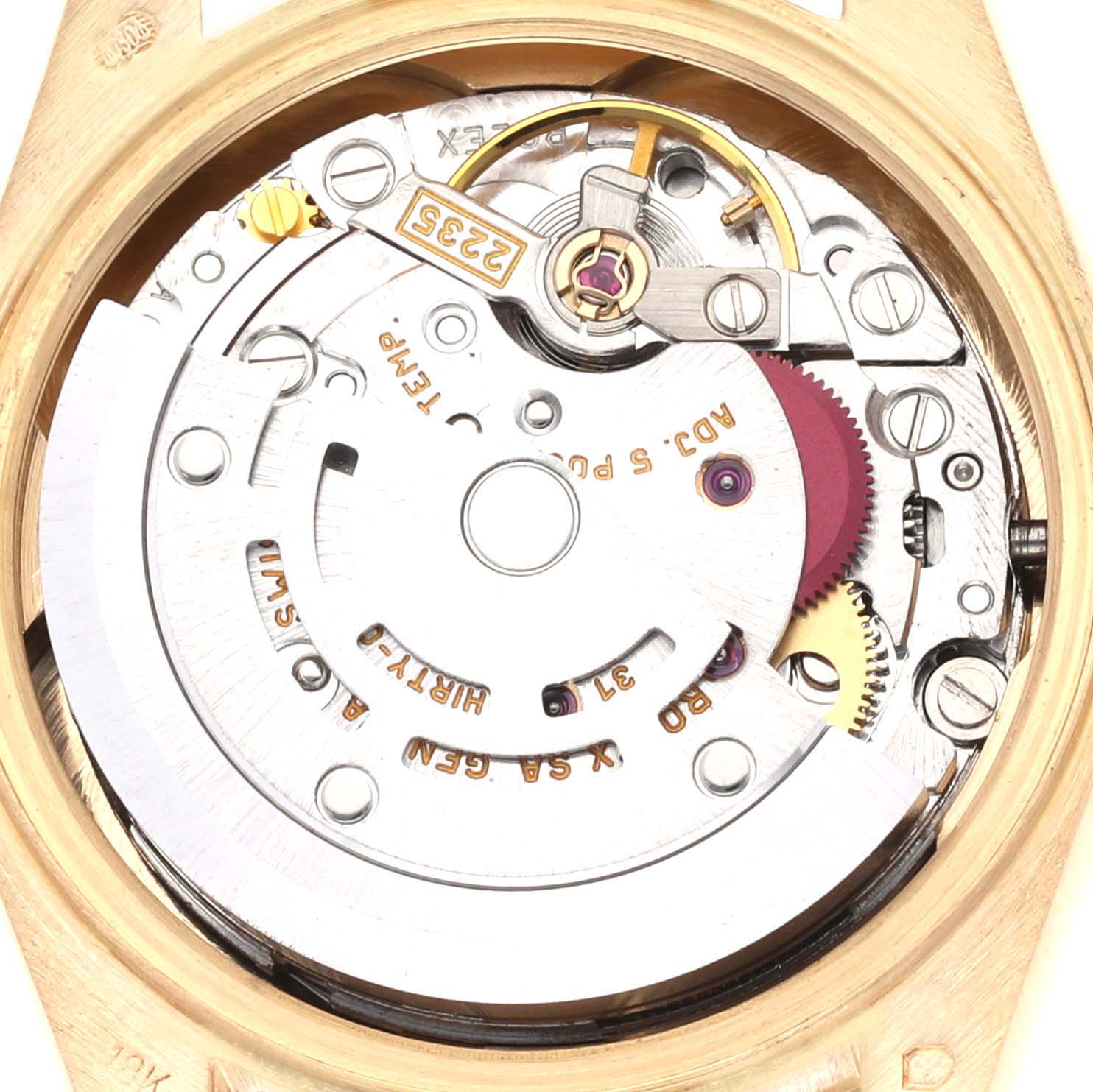 The image shows a close-up of the movement inside a Rolex President 79178 Women's Yellow Gold Champagne Dial 79178 Women's Yellow Gold Champagne Dial watch, highlighting the complex inner mechanisms.