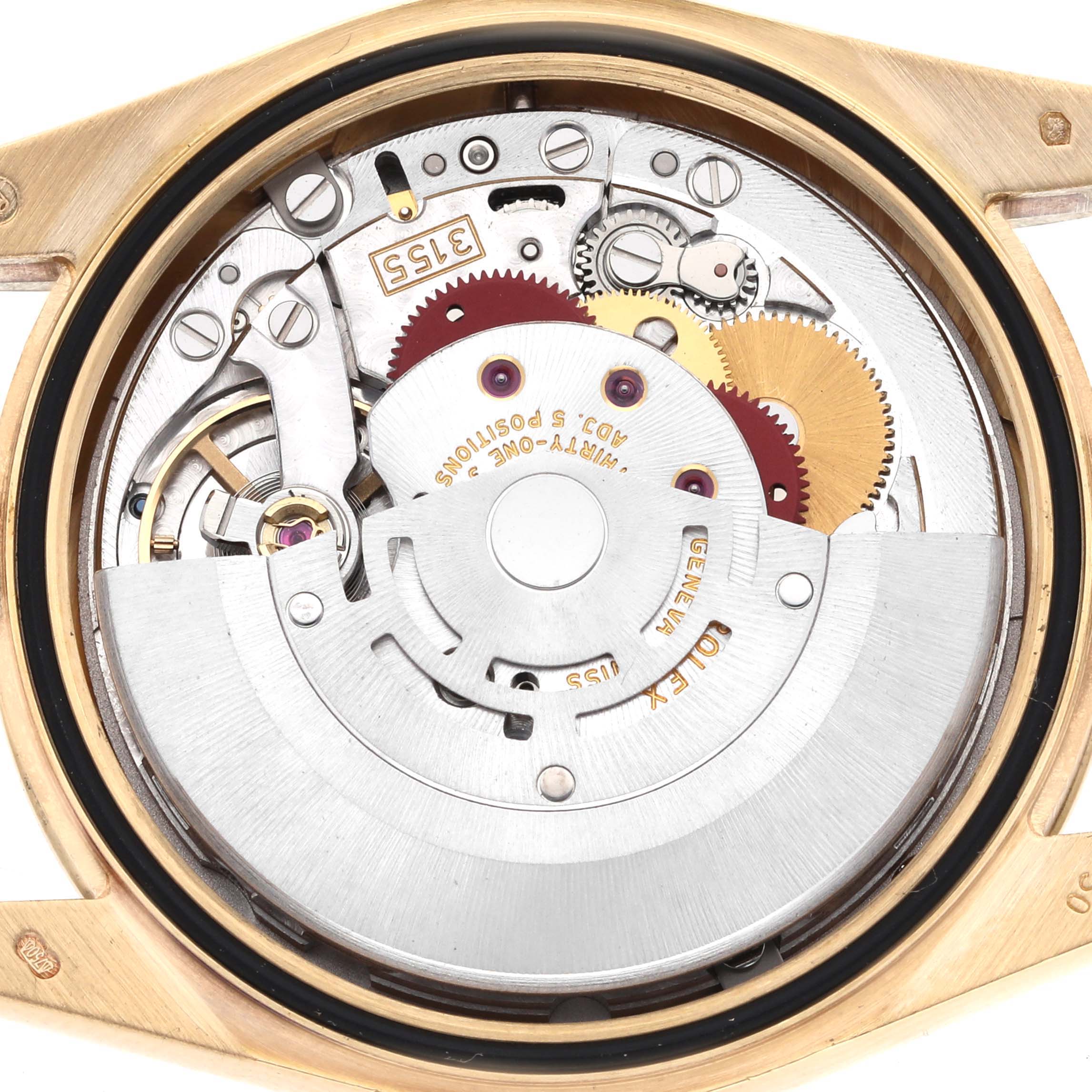 The image shows the inner mechanism of the Rolex President 118348 Men's Yellow Gold Champagne Dial 118348 Men's Yellow Gold Champagne Dial model from a top-down angle, revealing gears and rotors.