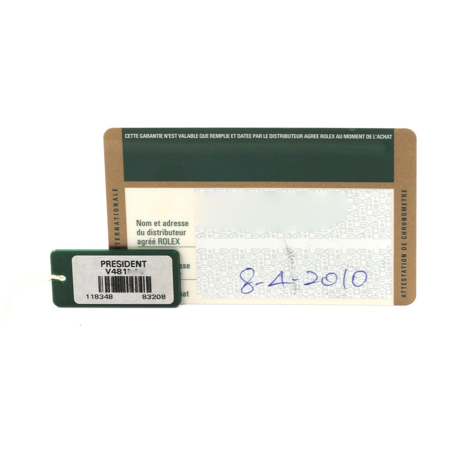 The image shows a warranty card and tag for the Rolex President 118348 Men's Yellow Gold Champagne Dial 118348 Men's Yellow Gold Champagne Dial model, featuring model and serial numbers.