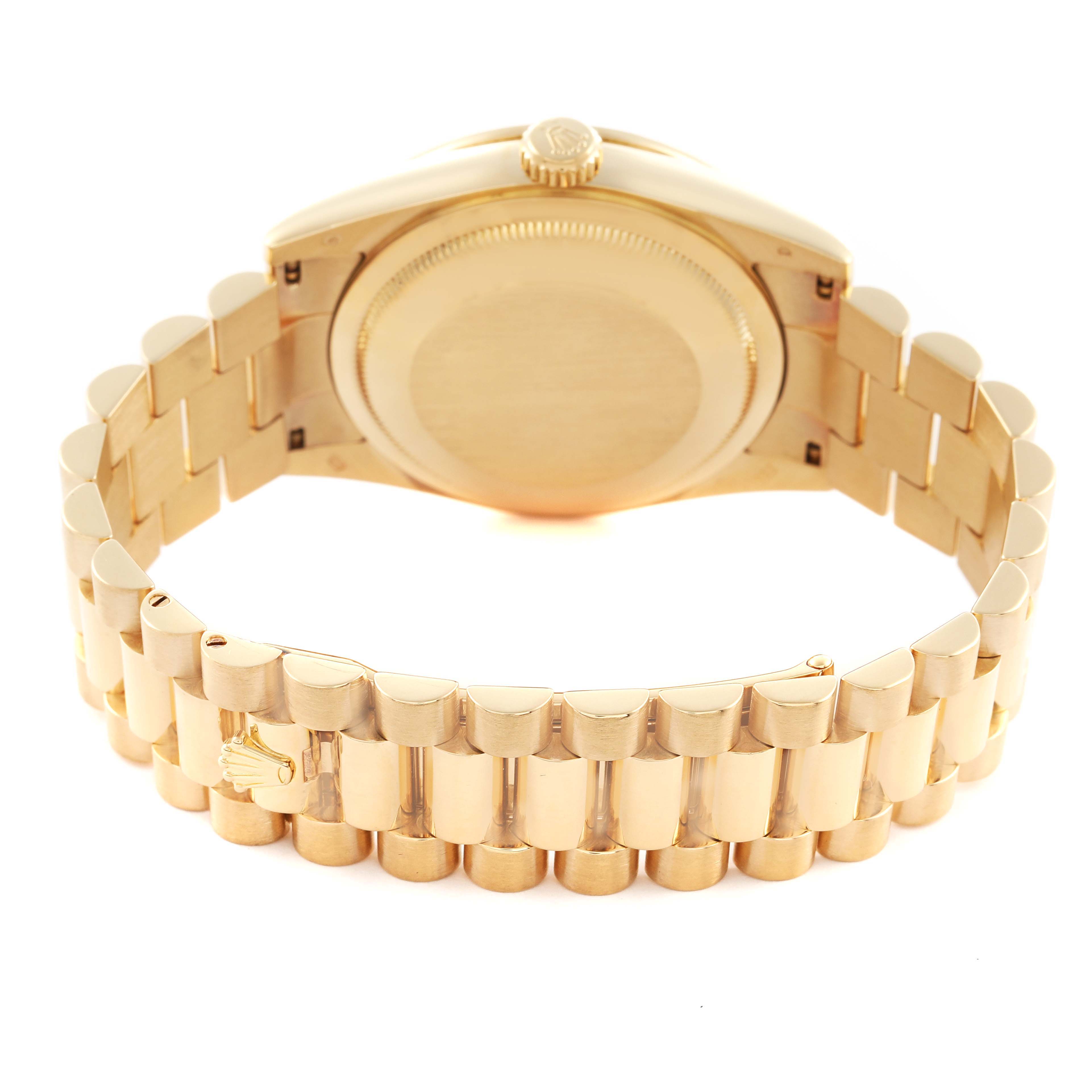 The image shows the back view of a Rolex President 118348 Men's Yellow Gold Champagne Dial 118348 Men's Yellow Gold Champagne Dial model, highlighting its bracelet and case back.