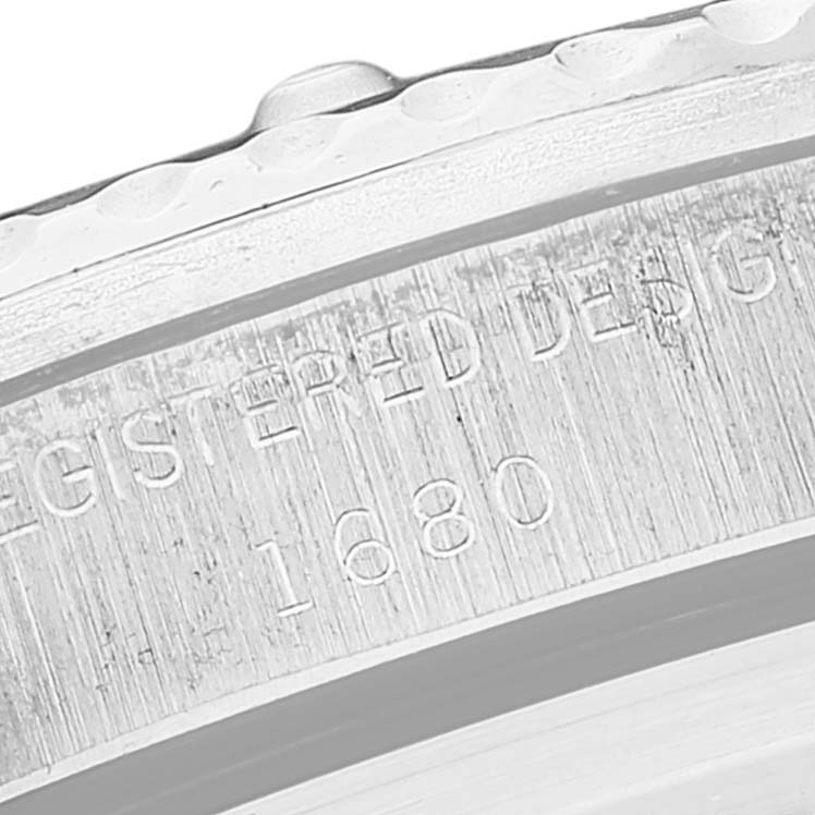 This image shows a close-up of the model number "1680" engraved inside the case of a Rolex Vintage Collection 1680 Men's Stainless Steel Black Dial 1680 Men's Stainless Steel Black Dial watch.