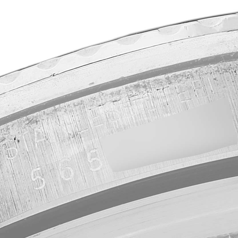 This close-up image shows the serial number engraving on the side of a Rolex Vintage Collection 1680 Men's Stainless Steel Black Dial 1680 Men's Stainless Steel Black Dial watch.