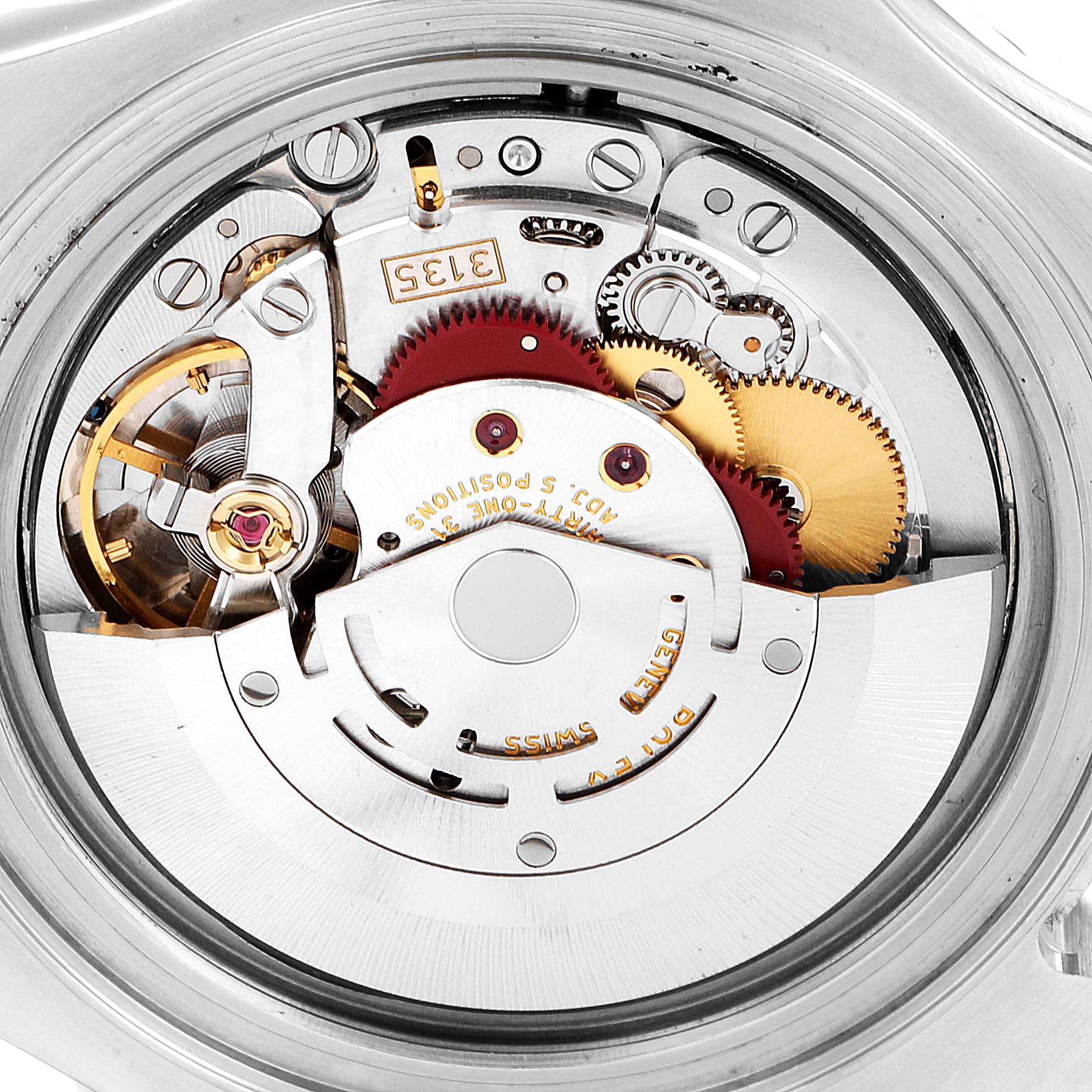 This image shows a close-up view of the internal mechanism of a Rolex Yacht-Master 16622 Men's Stainless Steel Silver Dial 16622 Men's Stainless Steel Silver Dial watch, featuring gears and other components.