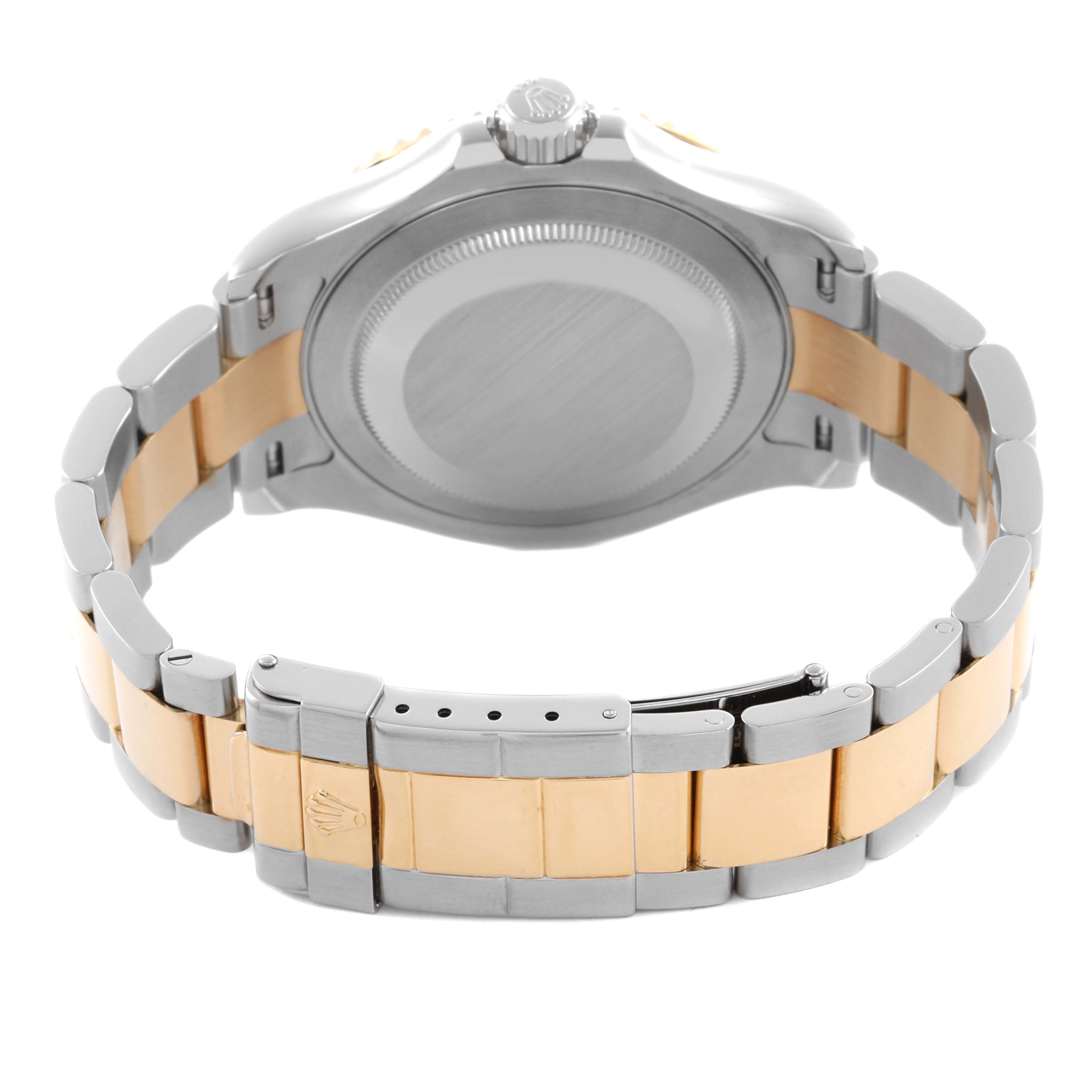 The Rolex Yacht-Master 16623 Men's Steel and Gold (two tone) White Dial 16623 Men's Steel and Gold (two tone) White Dial is shown from the back, featuring the case back and bracelet with a silver-gold tone.