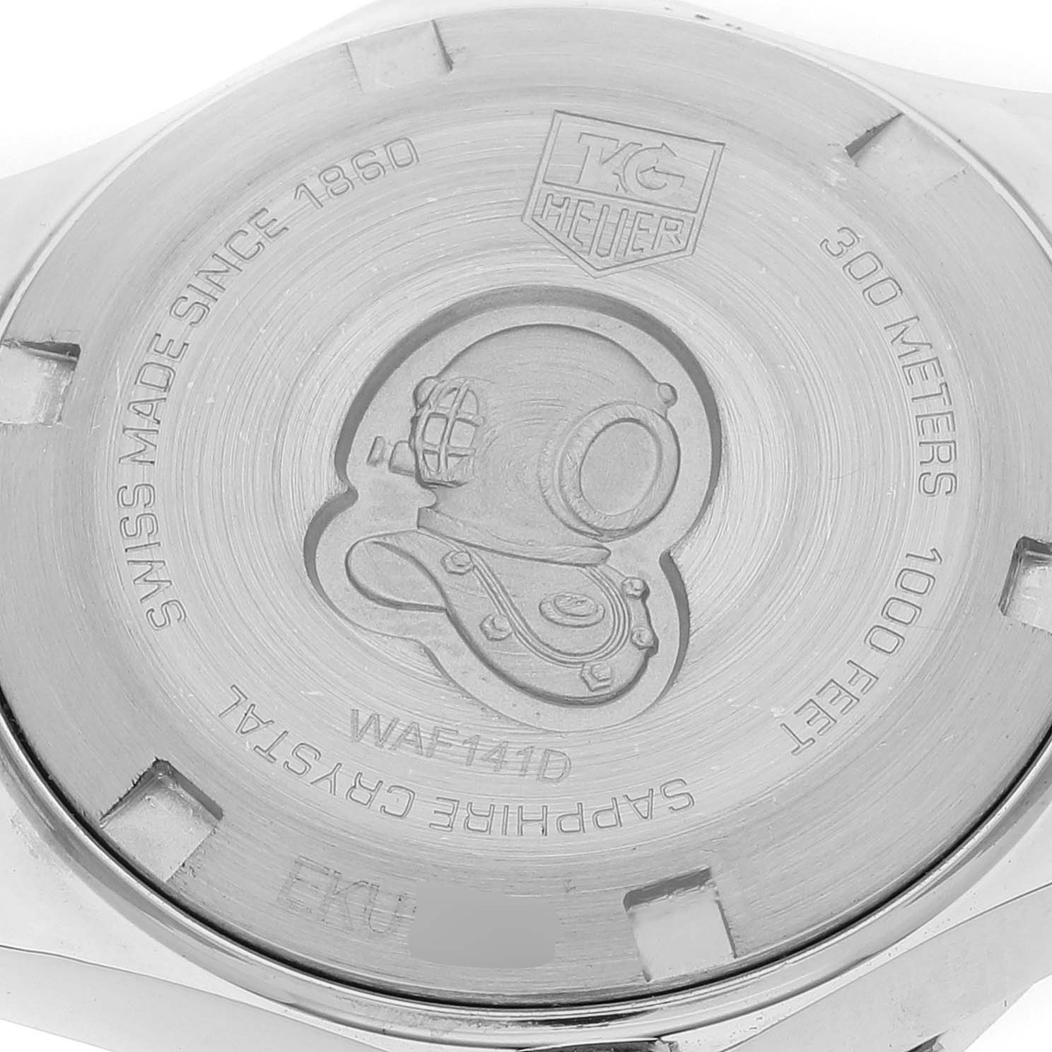 This image shows the back case of the Tag Heuer Aquaracer WAF141D Women's Stainless Steel Black Dial WAF141D Women's Stainless Steel Black Dial watch, featuring the brand logo and various engravings.