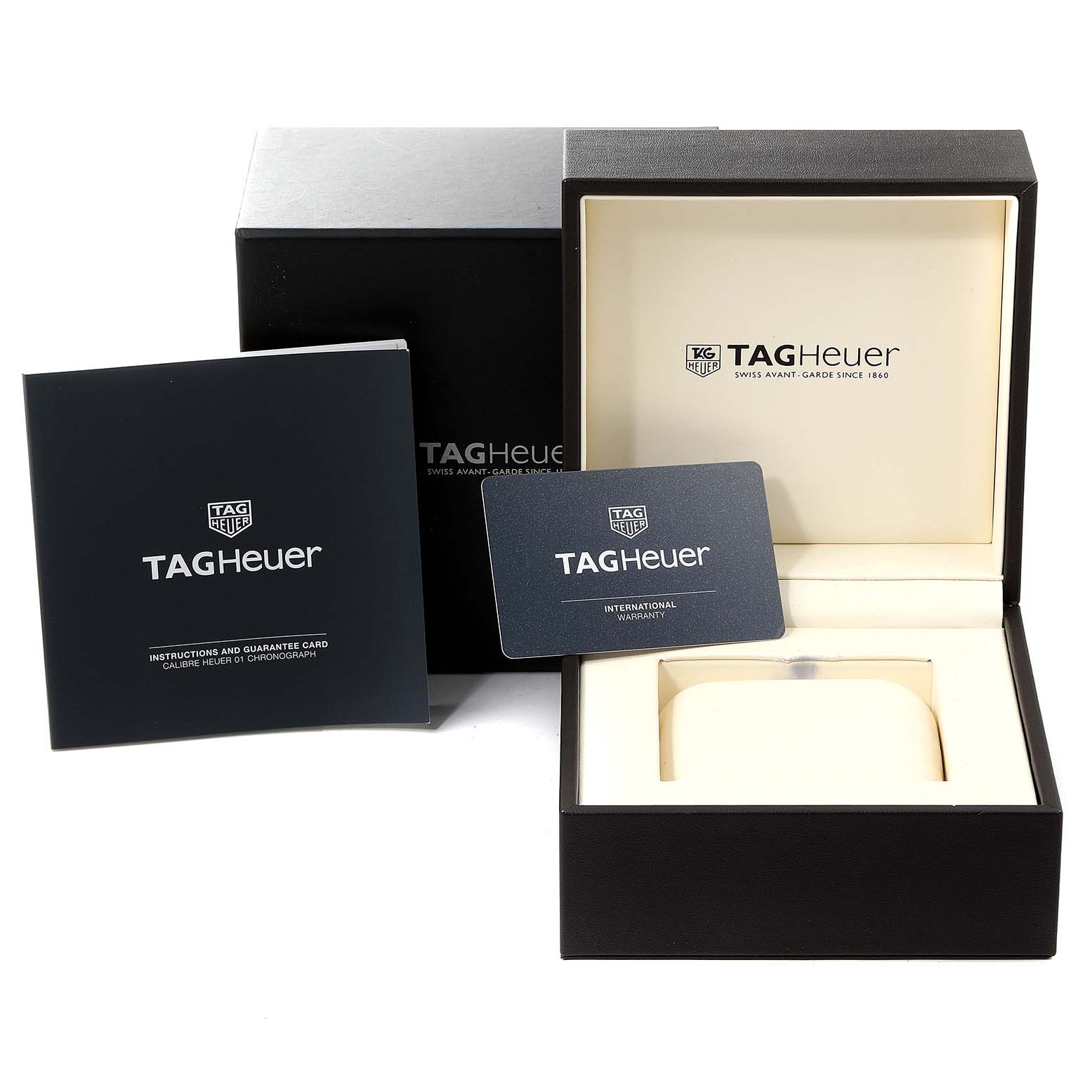 This image shows the packaging, international warranty card, and instruction booklet for a Tag Heuer Carrera CAR201V.BA0714 Men's Stainless Steel Black Dial CAR201V.BA0714 Men's Stainless Steel Black Dial watch.