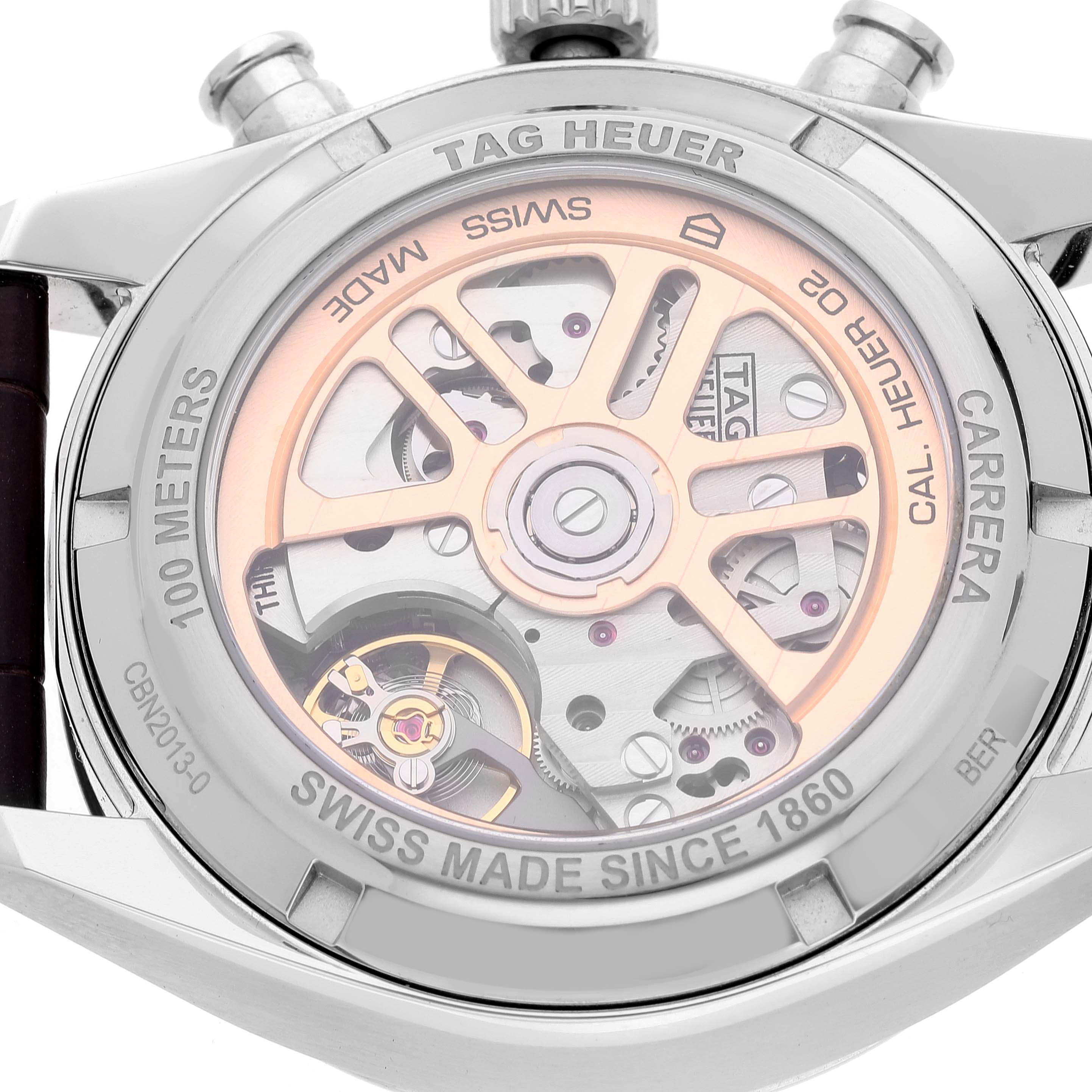 This image shows the case back of a Tag Heuer Carrera CBN2013.FC6483 Men's Stainless Steel Silver Dial CBN2013.FC6483 Men's Stainless Steel Silver Dial model watch, revealing its internal mechanism and engravings.