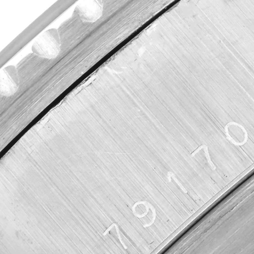 The image shows a close-up of the case side and engraved serial number of a Tudor Big Block 79170 Men's Stainless Steel Black Dial 79170 Men's Stainless Steel Black Dial watch.