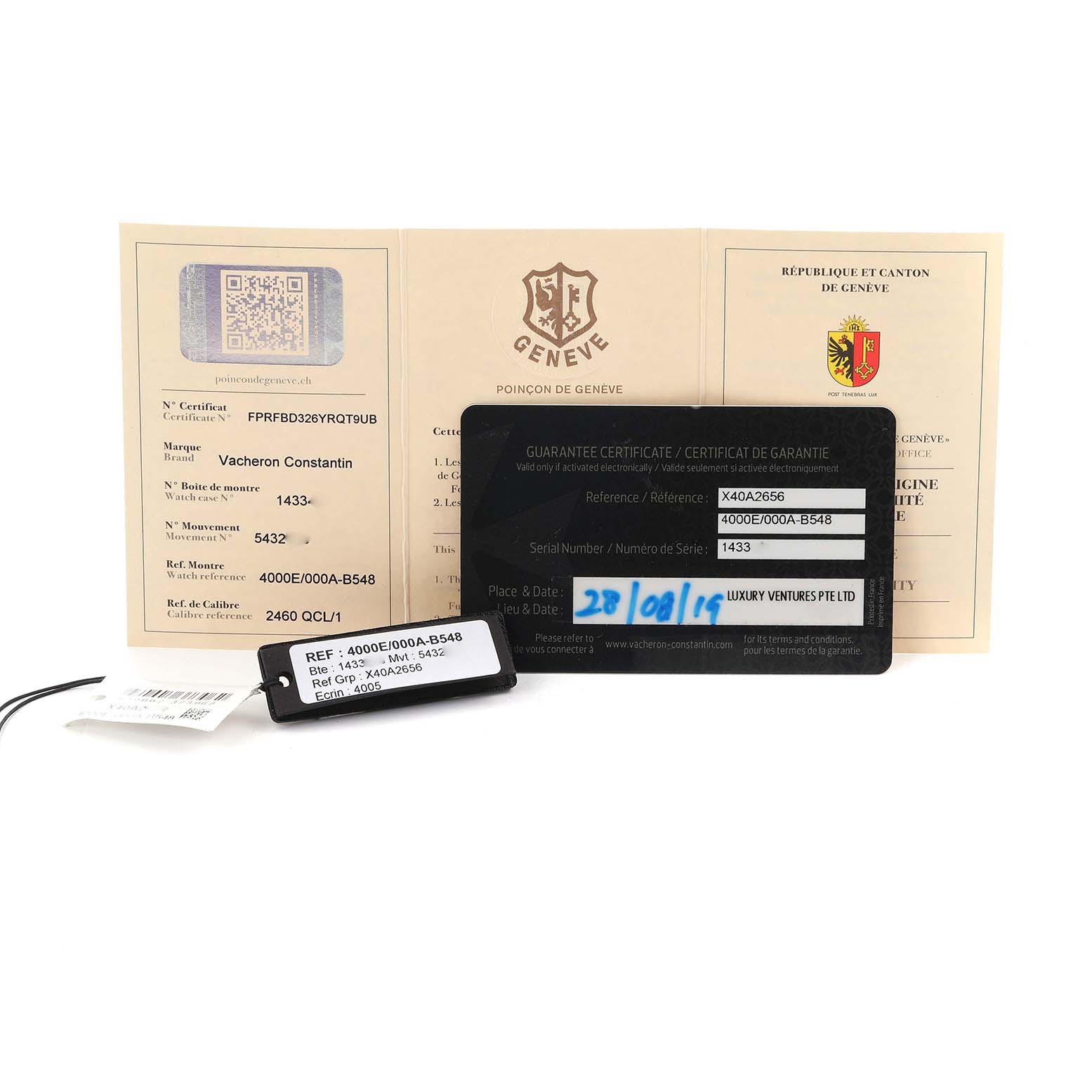 The image shows the warranty papers and tags for the Vacheron Constantin Fiftysix 4000E/000A-B548 Men's Stainless Steel Blue Dial 4000E/000A-B548 Men's Stainless Steel Blue Dial watch, viewed from above.