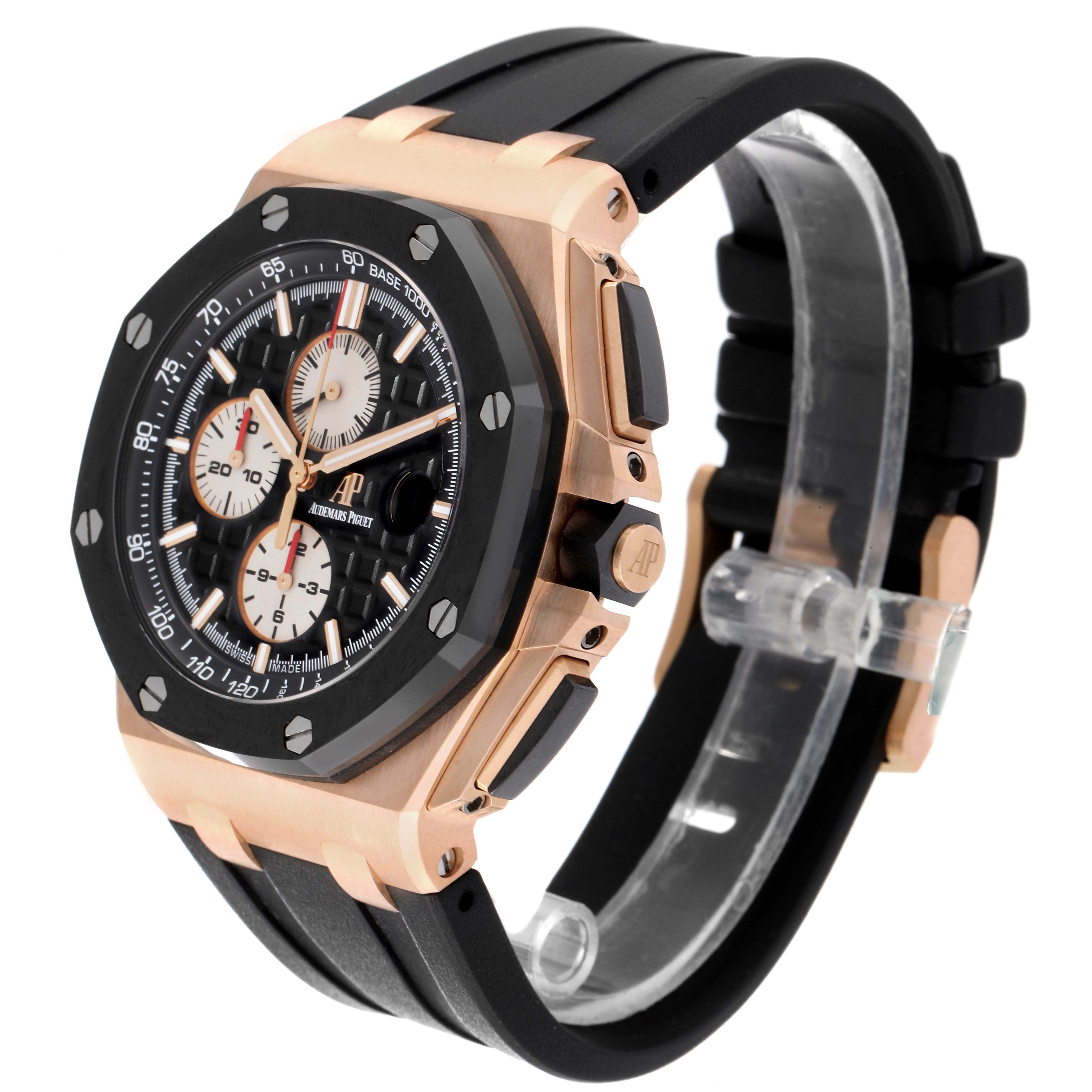 The Audemars Piguet Royal Oak Offshore 26401RO Men's Rose Gold Black Dial is shown at a three-quarter angle, displaying the case, bezel, crown, and rubber strap.