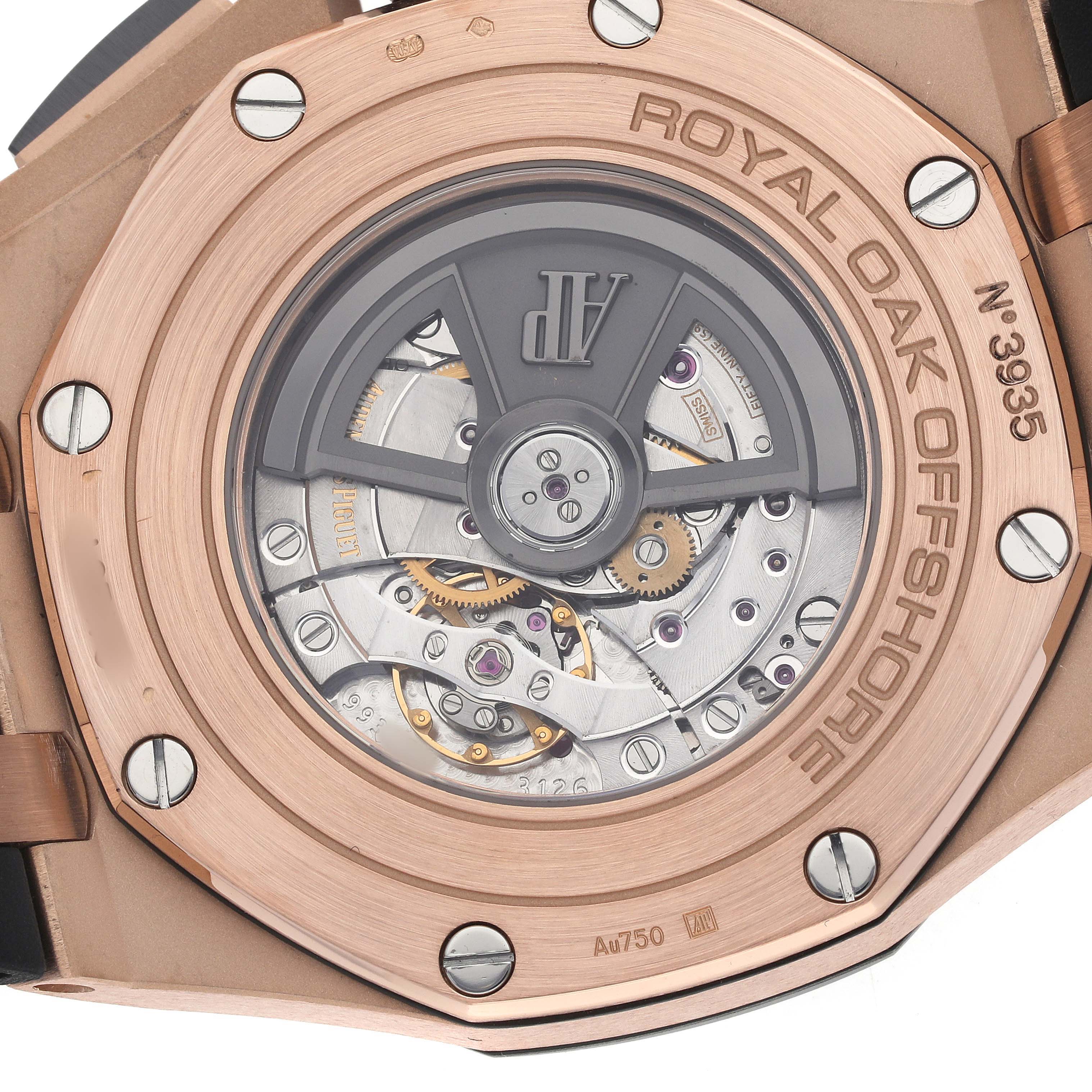 The image shows the caseback of a Royal Oak Offshore by Audemars Piguet, displaying the intricate movement and rotor design.
