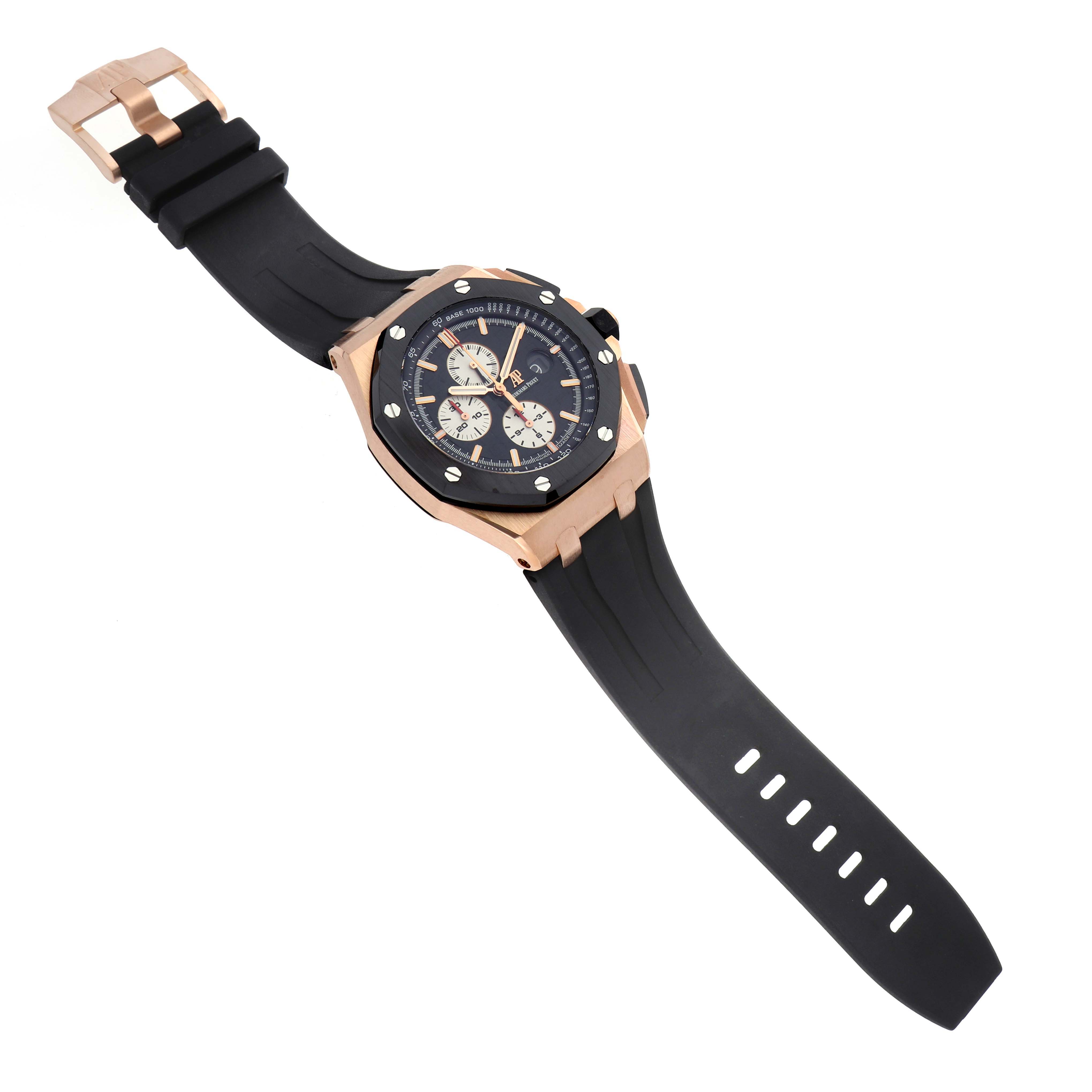 The Audemars Piguet Royal Oak Offshore 26401RO Men's Rose Gold Black Dial is shown at a tilted angle, displaying the face, bezel, and black strap.