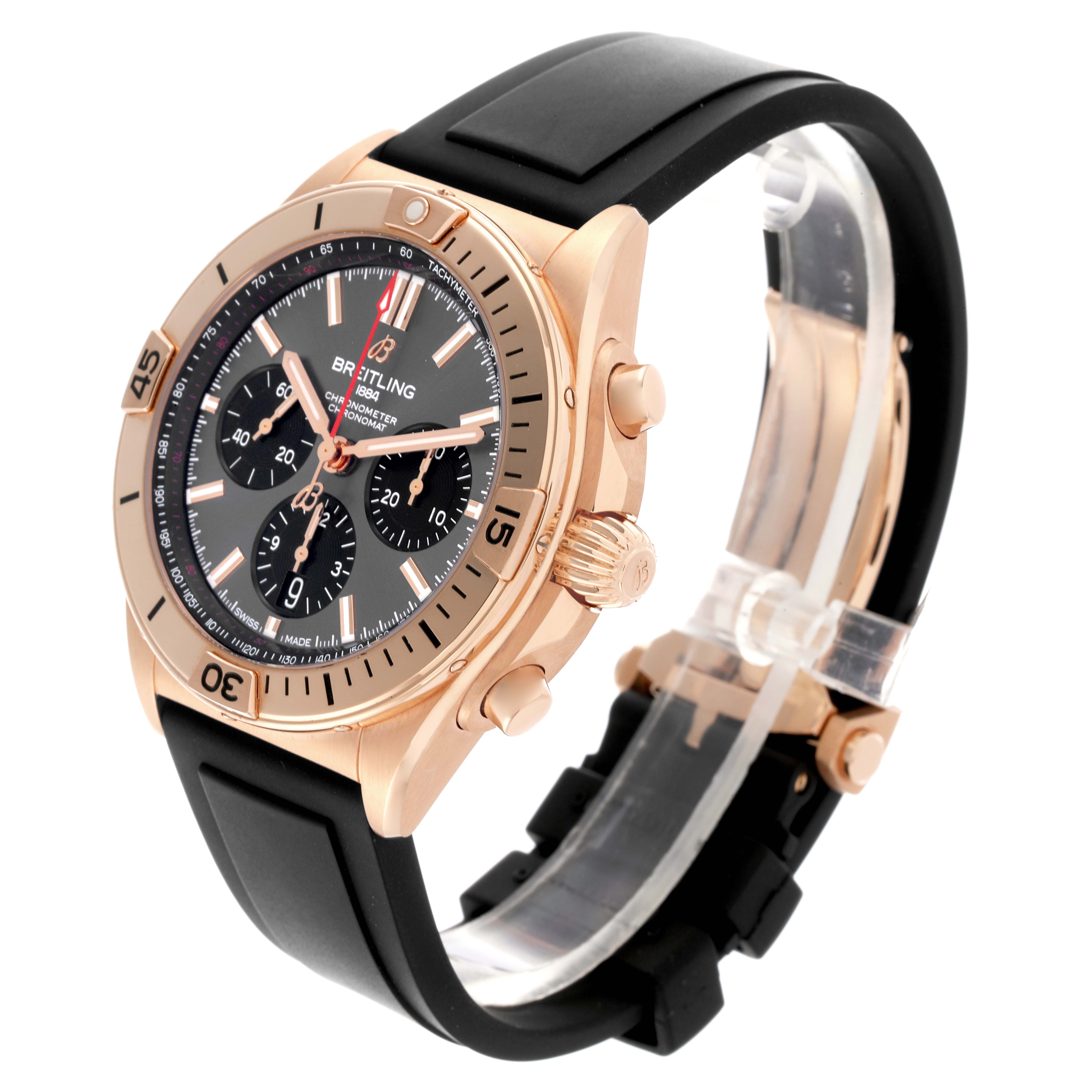 The Breitling Chronomat RB0134 Men's Rose Gold Grey Dial RB0134 Men's Rose Gold Grey Dial watch is shown at a three-quarter angle, highlighting the rose gold case, black dial, bezel, and black strap.