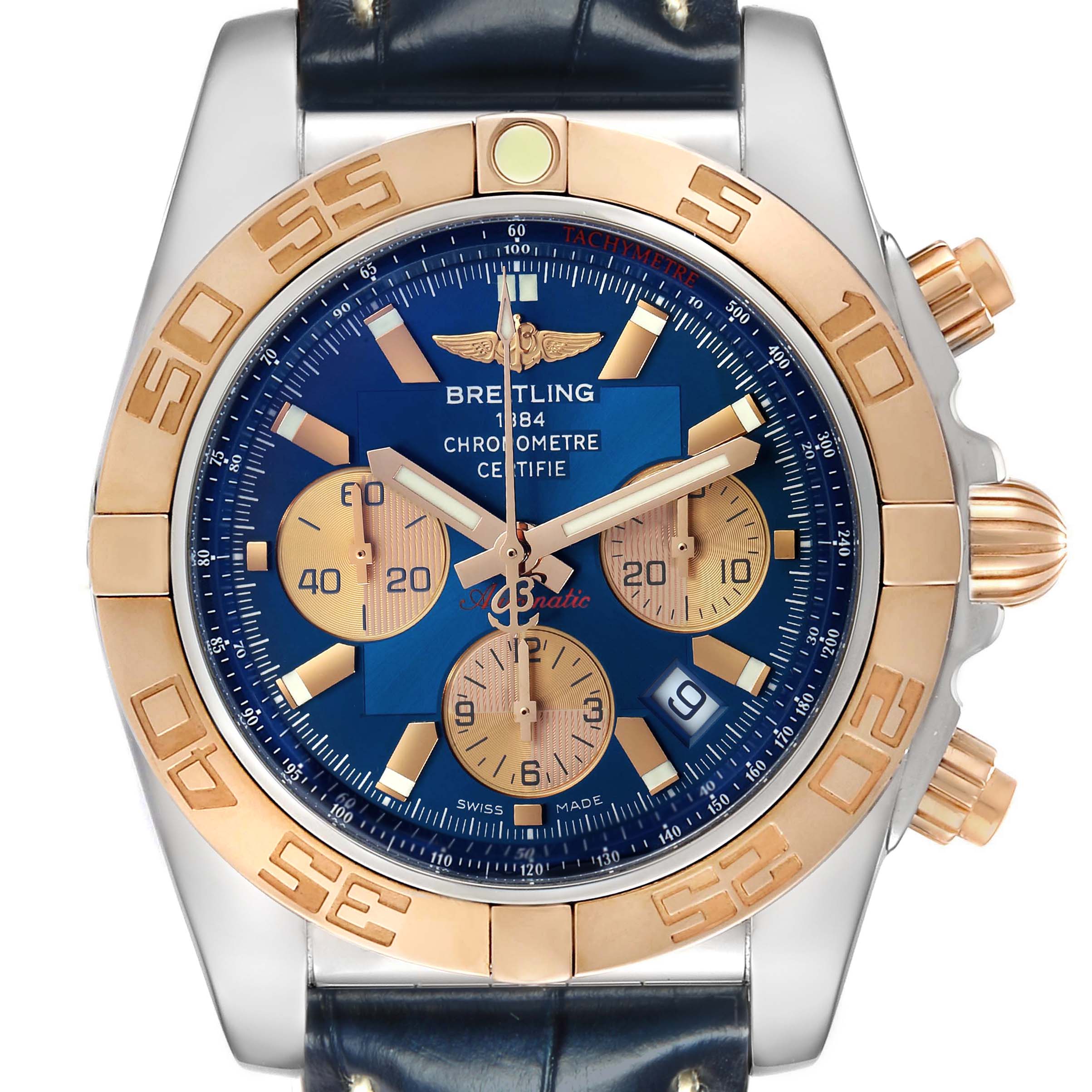 The Breitling Chronomat CB0110 Men's Steel and Gold (two tone) Blue Dial watch is shown from a front angle, highlighting its blue dial, gold bezel, and chronograph subdials.
