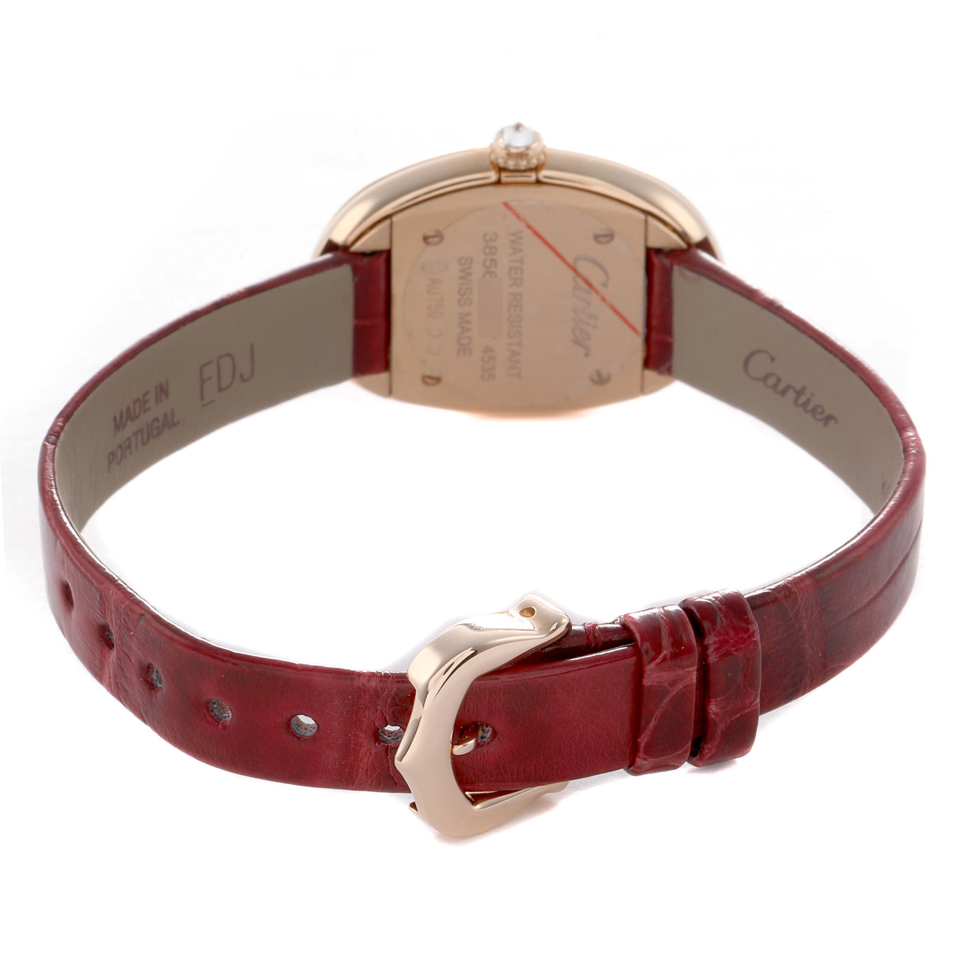 The image shows the back view of the Cartier Baignoire WJBA0031 Women's Rose Gold Silver Dial watch, highlighting its case back, buckle, and strap.