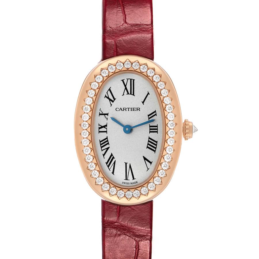 The Cartier Baignoire WJBA0031 Women's Rose Gold Silver Dial watch is shown from a front angle, highlighting its oval dial, diamond bezel, and red leather strap.