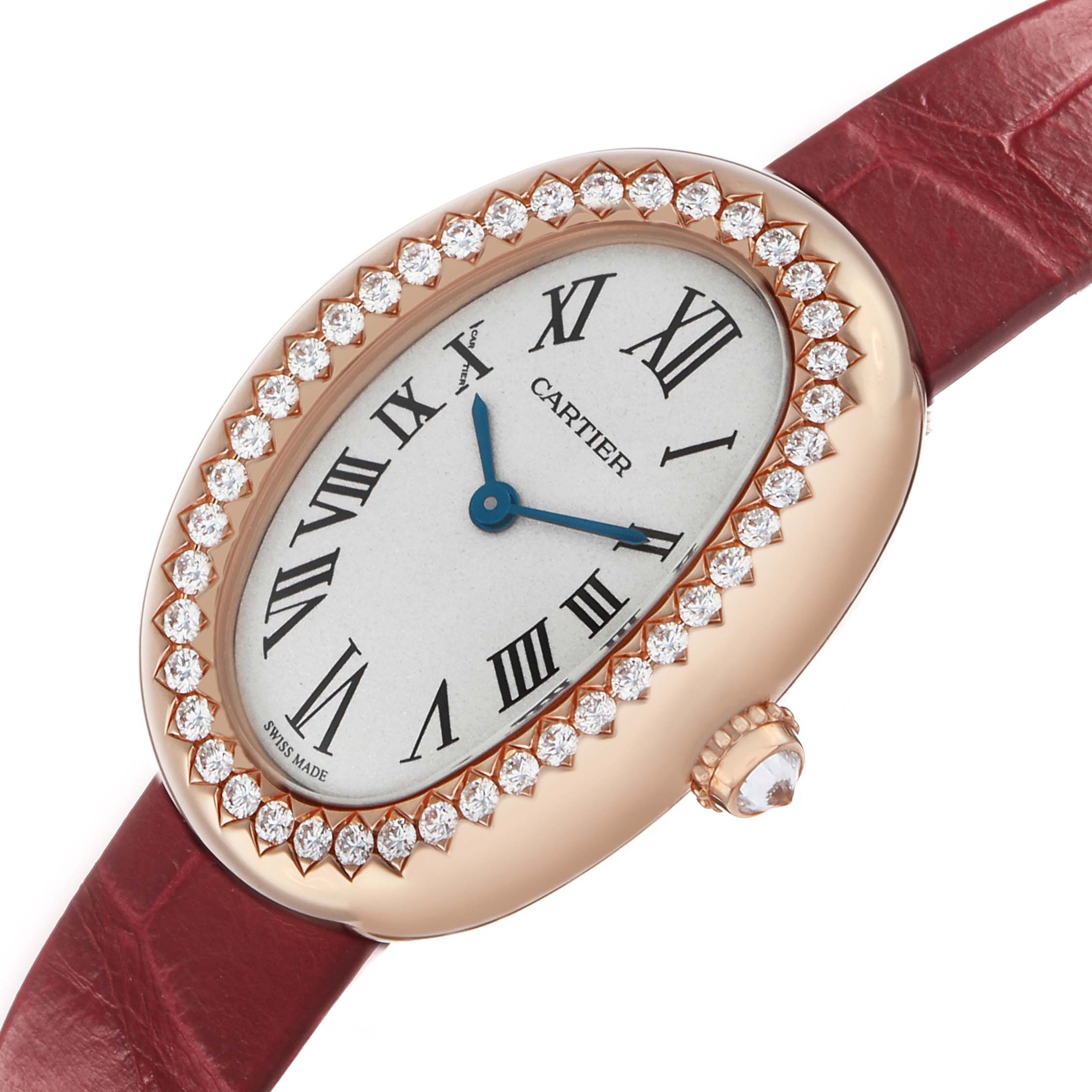 The Cartier Baignoire WJBA0031 Women's Rose Gold Silver Dial watch is shown at an angle highlighting its oval face, diamond bezel, and red strap.