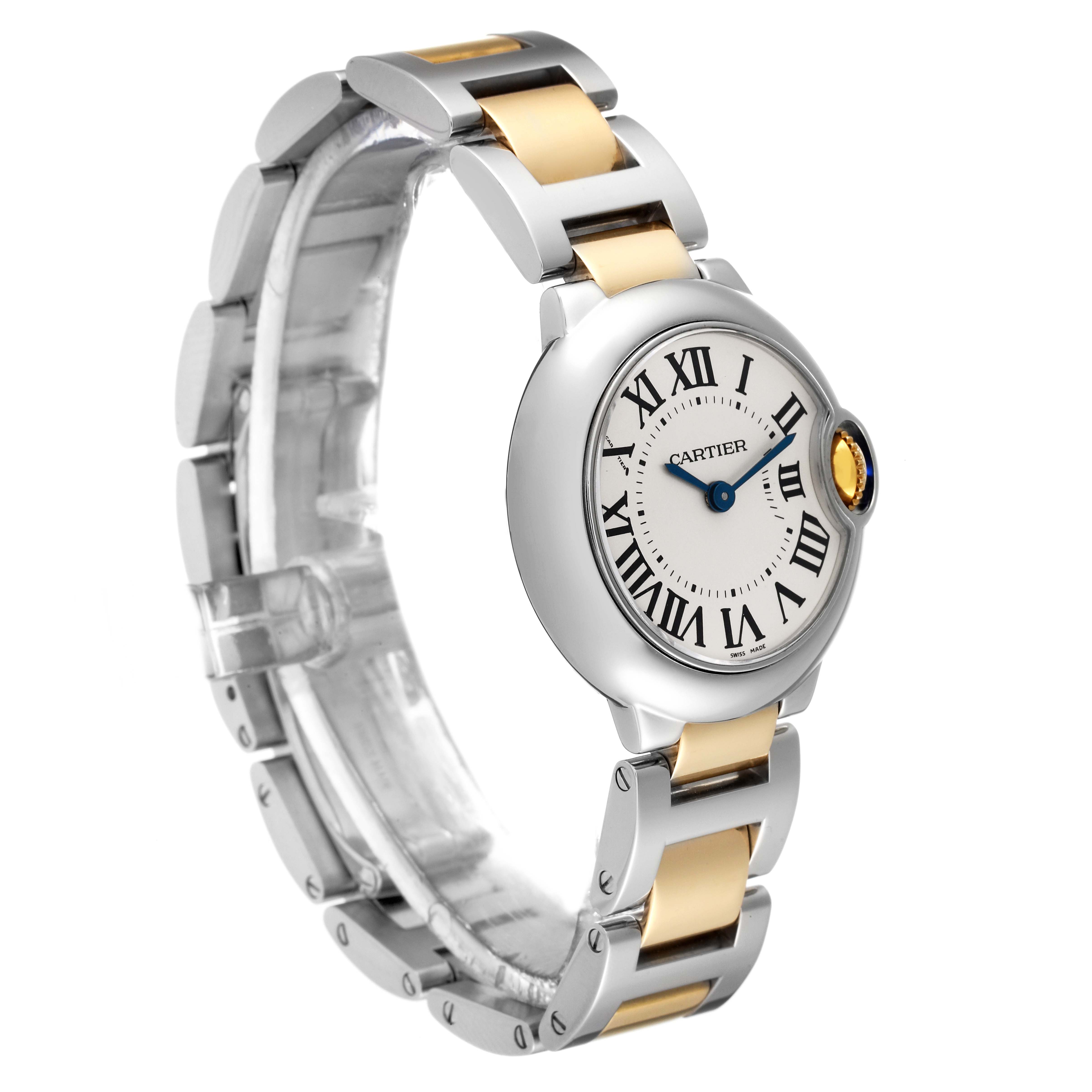 The image shows a Cartier Ballon Bleu W2BB0010 Women
s Steel and Gold (two tone) Silver Dial W2BB0010 Women
s Steel and Gold (two tone) Silver Dial watch at a three-quarter angle, highlighting the case, dial, and metal bracelet.