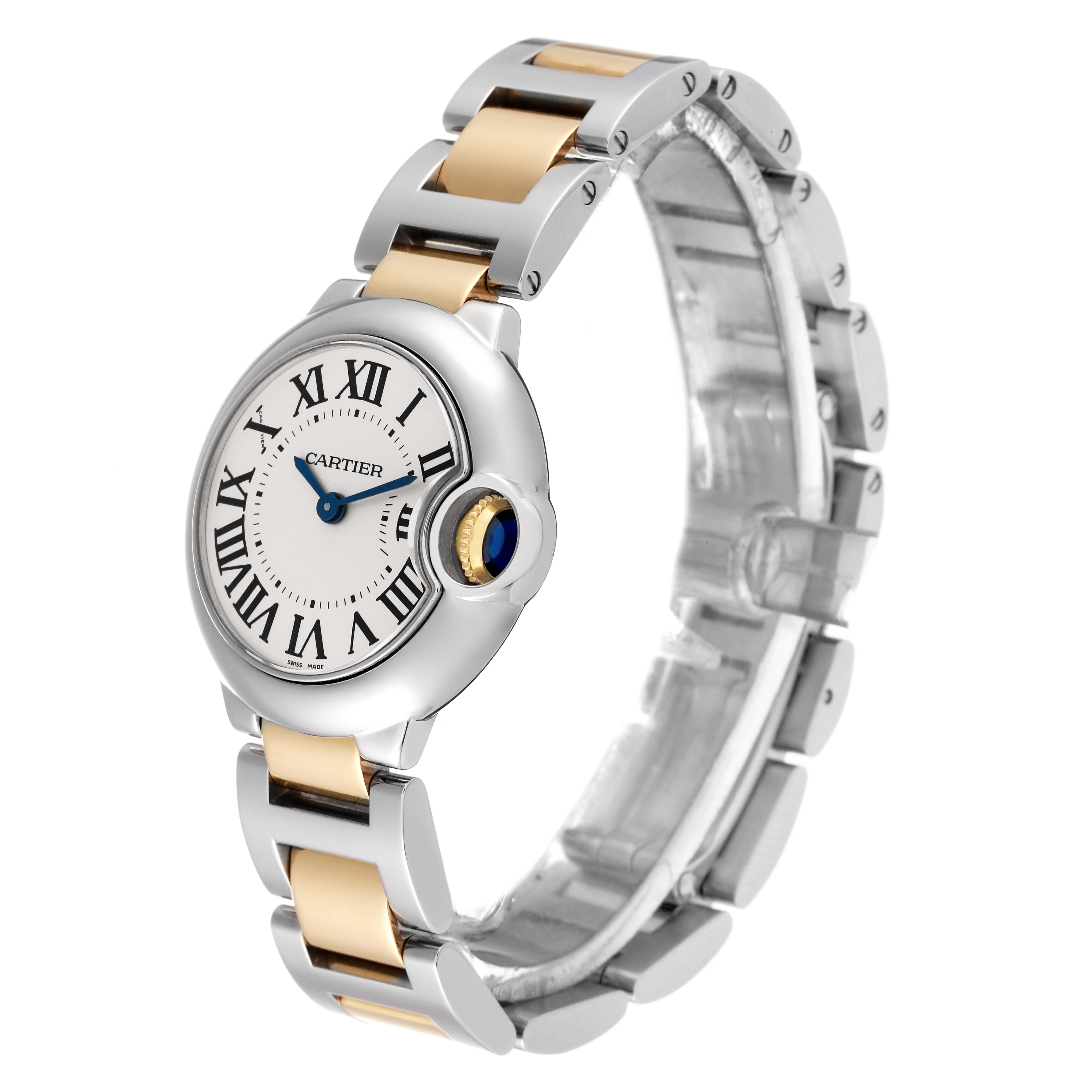 The image shows a side angle of a Cartier Ballon Bleu W2BB0010 Women
s Steel and Gold (two tone) Silver Dial W2BB0010 Women
s Steel and Gold (two tone) Silver Dial watch, highlighting its face and two-tone bracelet.