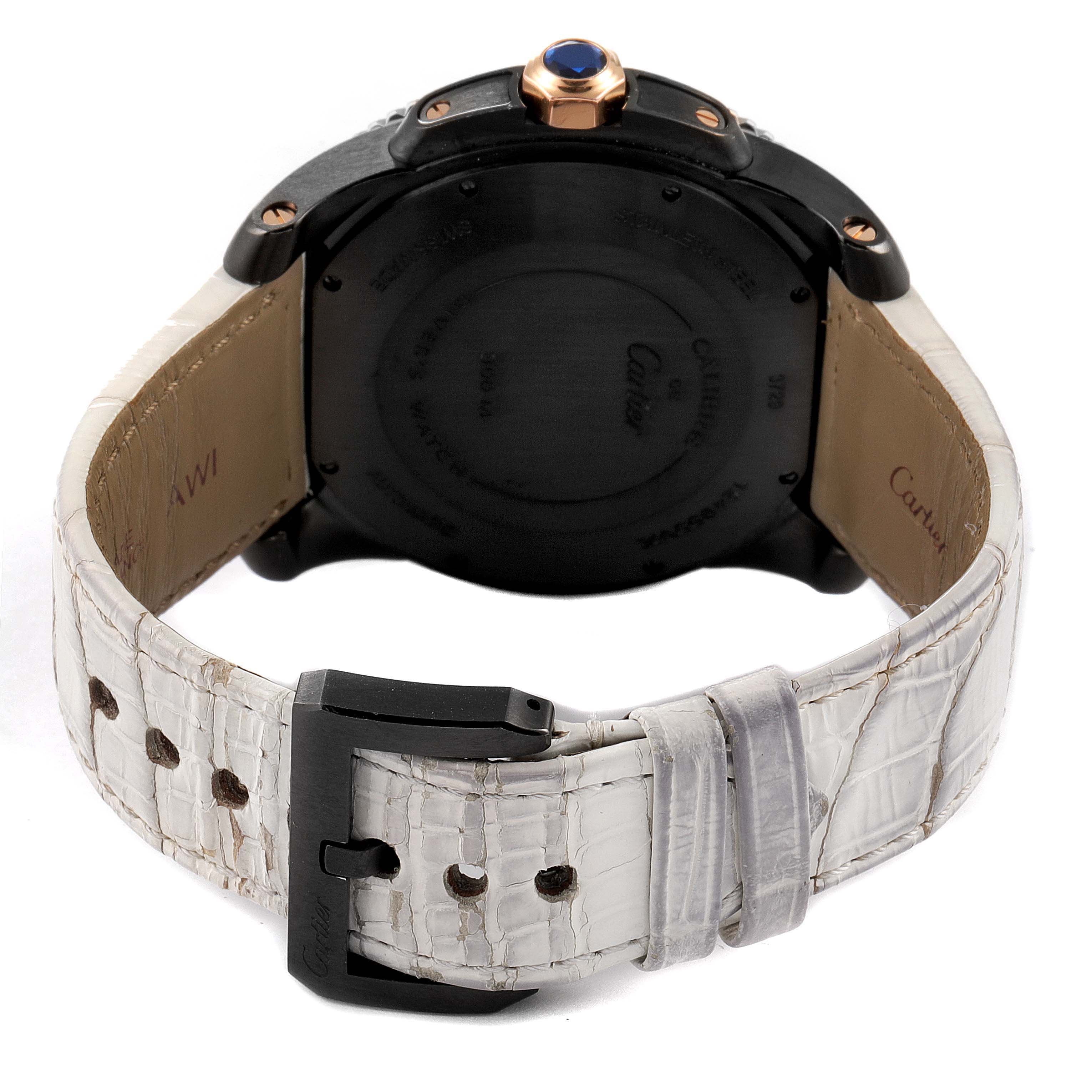 This image shows the back view of a Calibre de Cartier watch by Cartier, highlighting the black caseback, white strap, and clasp.