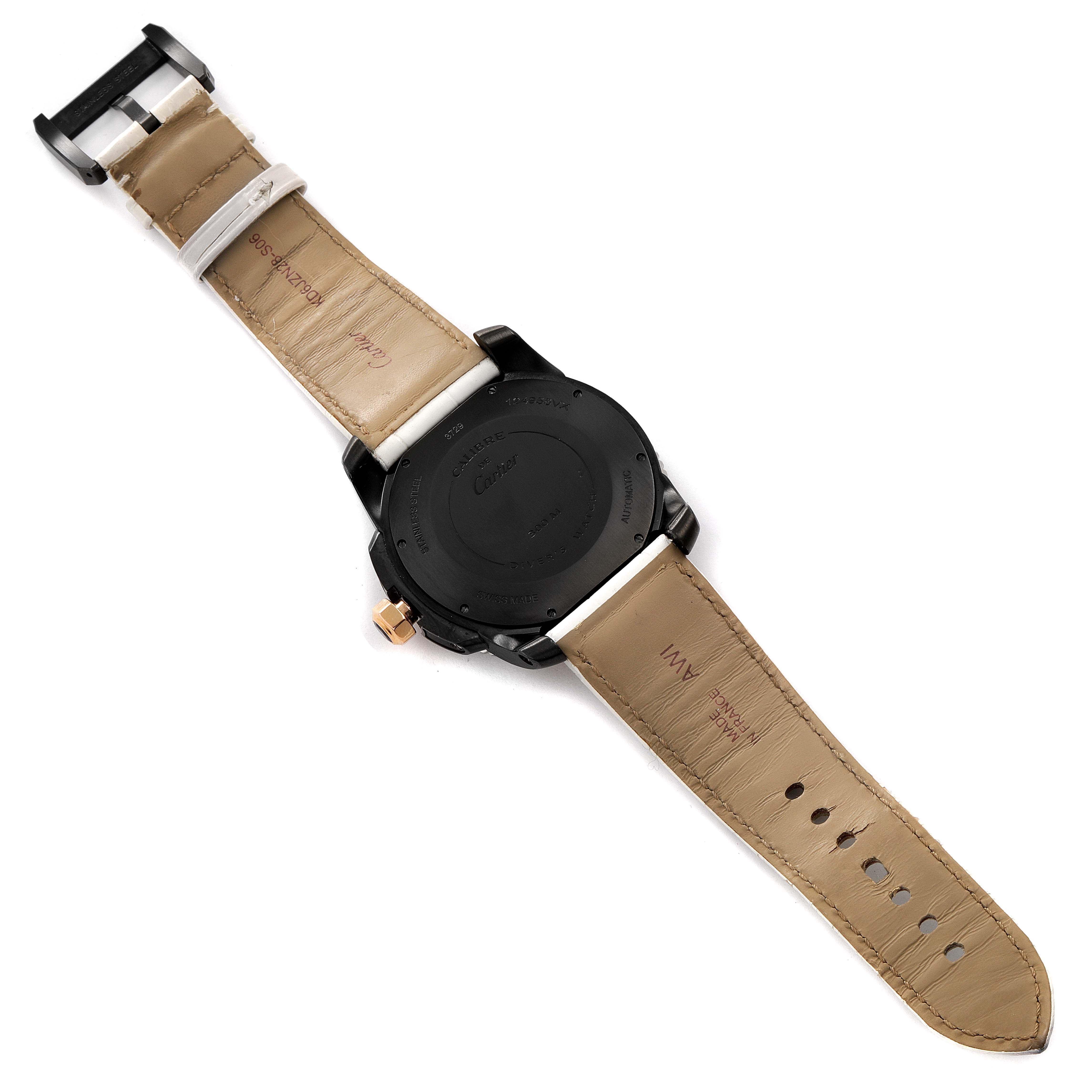 The image shows the back and strap of a Calibre de Cartier watch by Cartier.